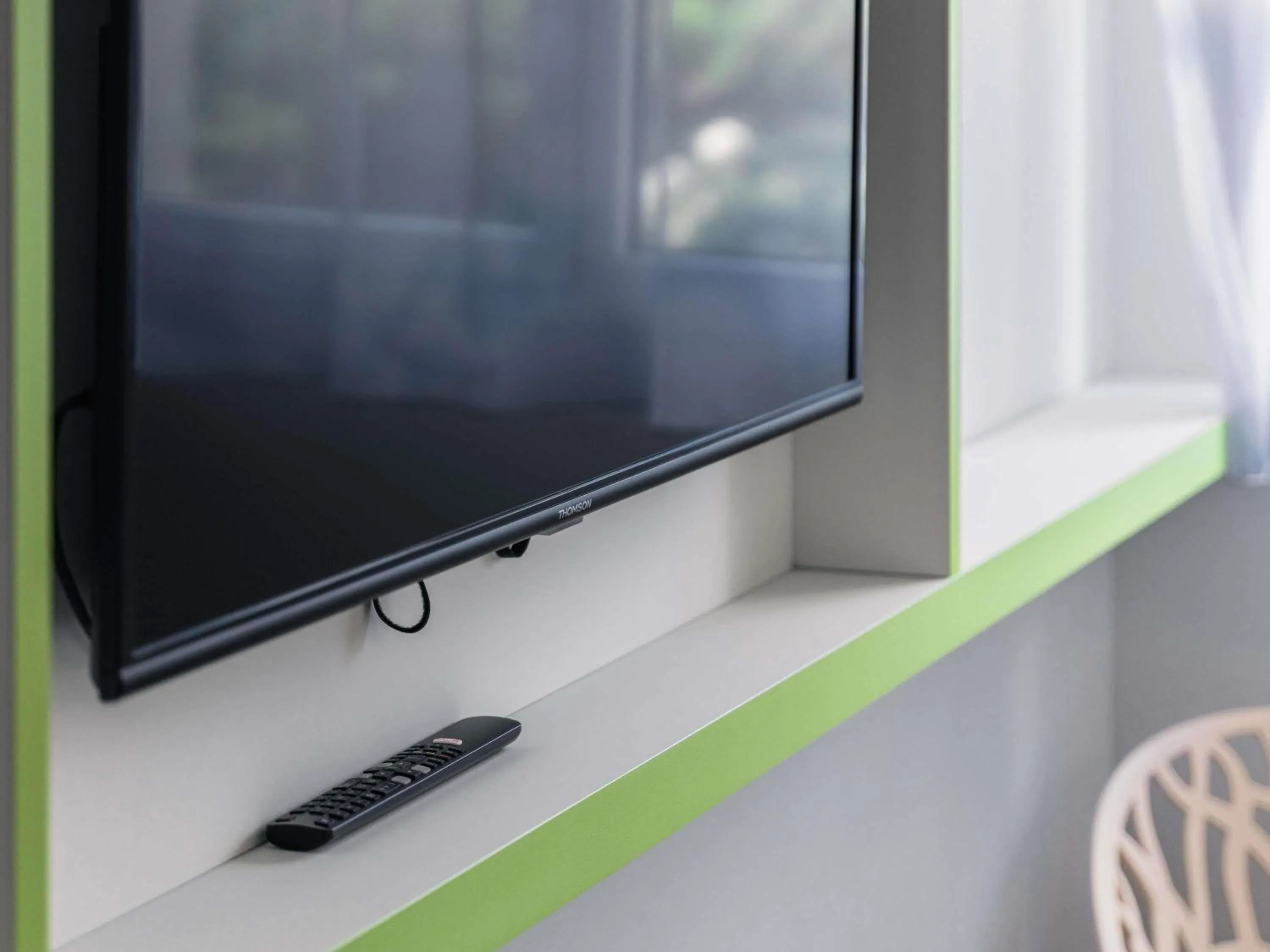 Bedroom in ibis Styles Fougeres