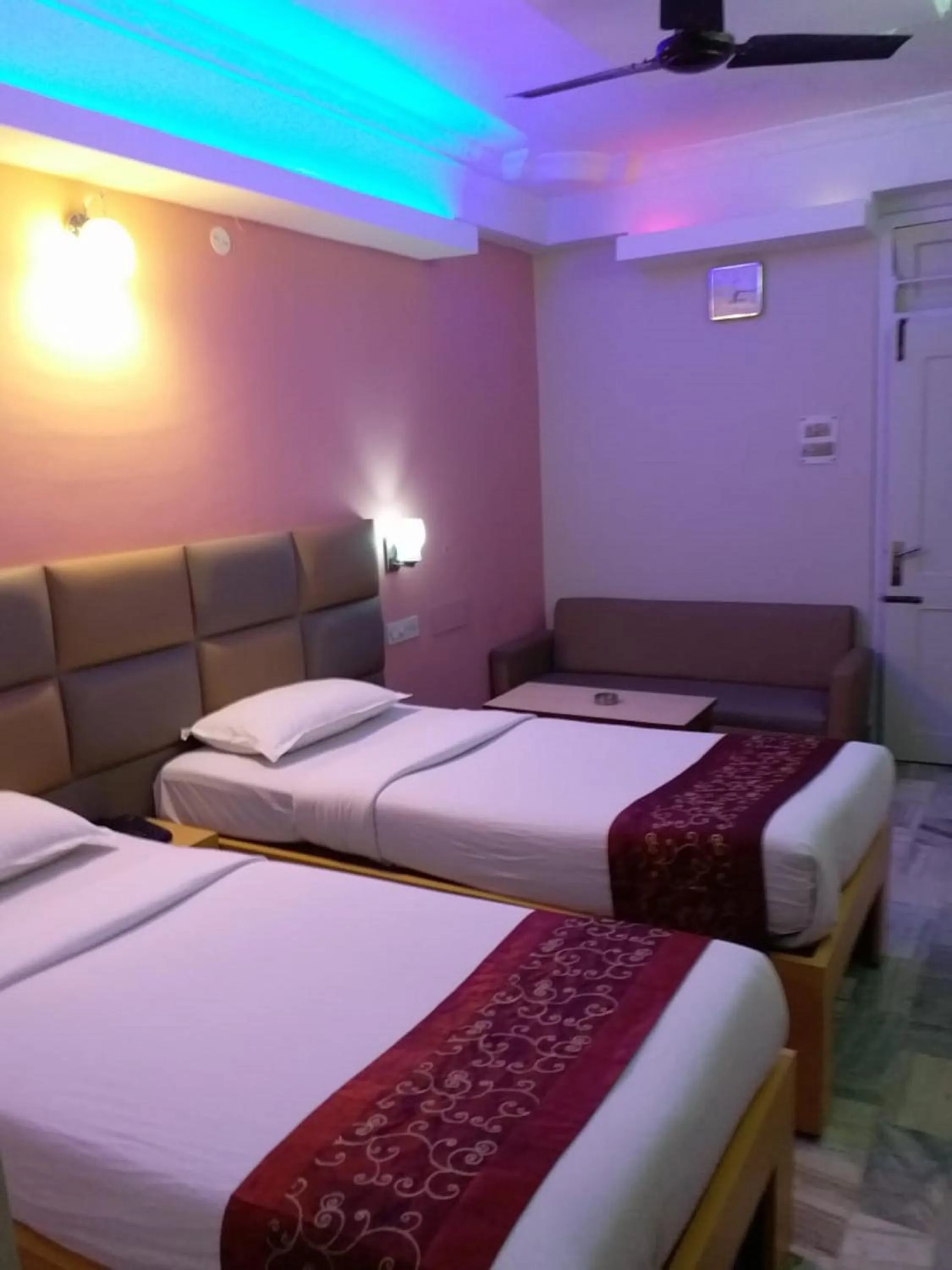 Bedroom in Hotel Mahalaxmi Indo Myanmar