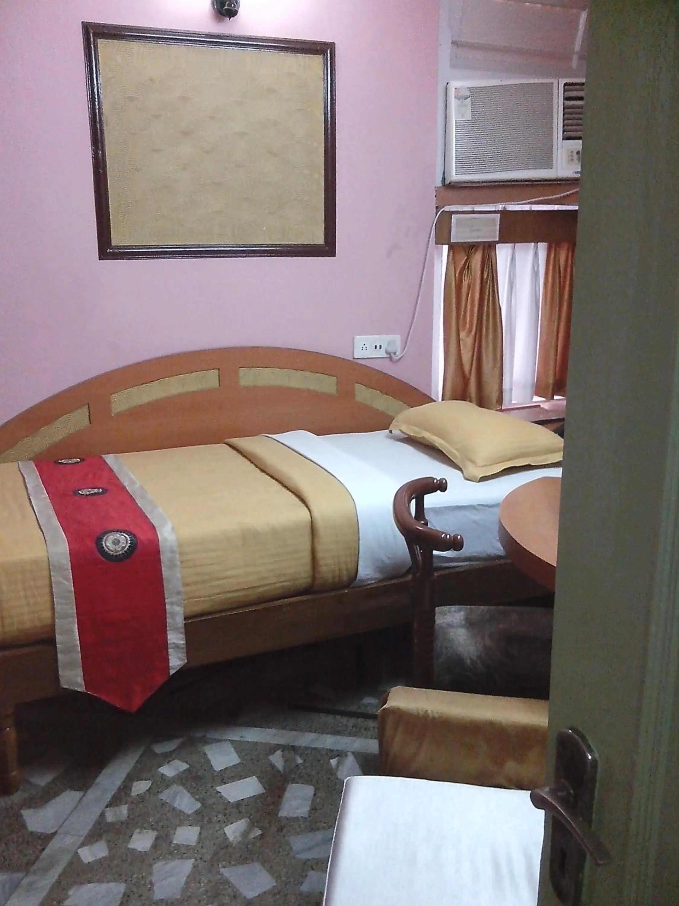 Photo of the whole room in Hotel Mahalaxmi Indo Myanmar