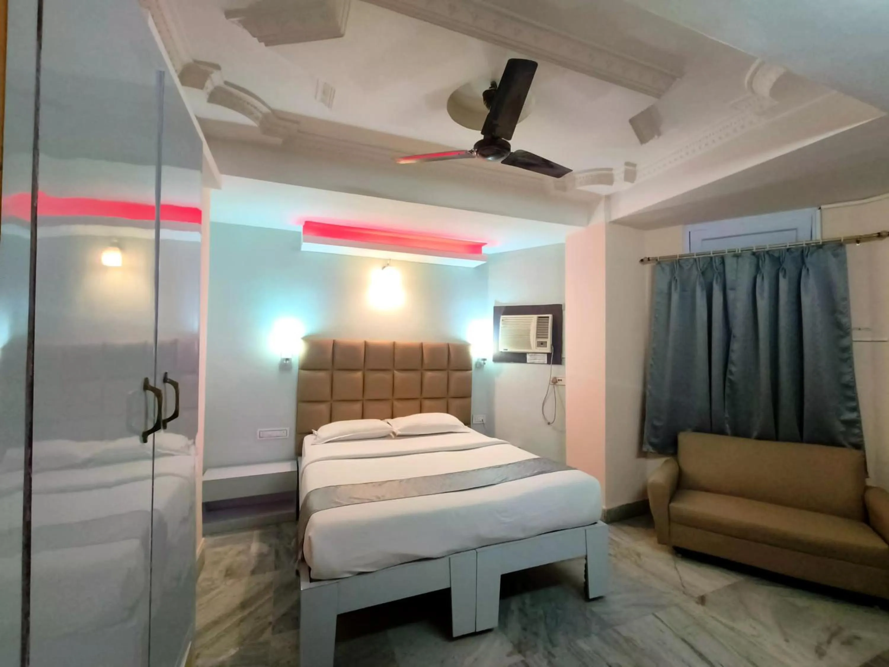 Bedroom in Hotel Mahalaxmi Indo Myanmar