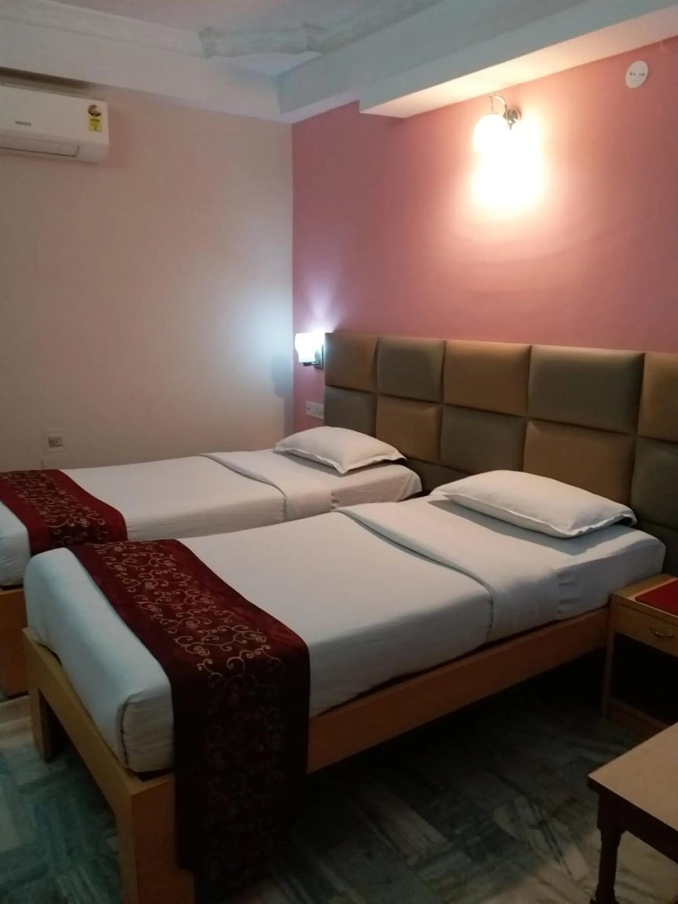 Bedroom in Hotel Mahalaxmi Indo Myanmar