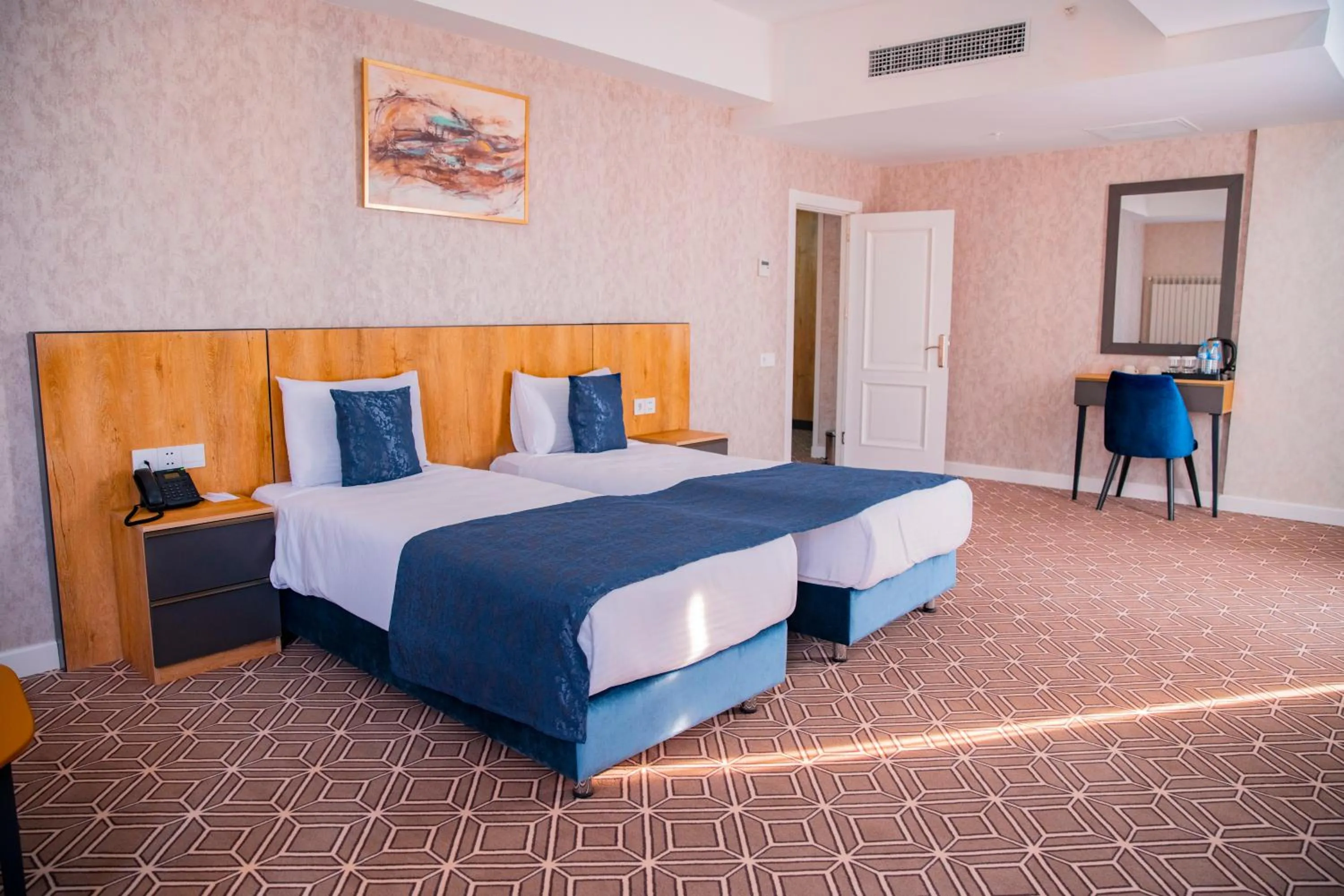 Bed in Arion Hotel Baku