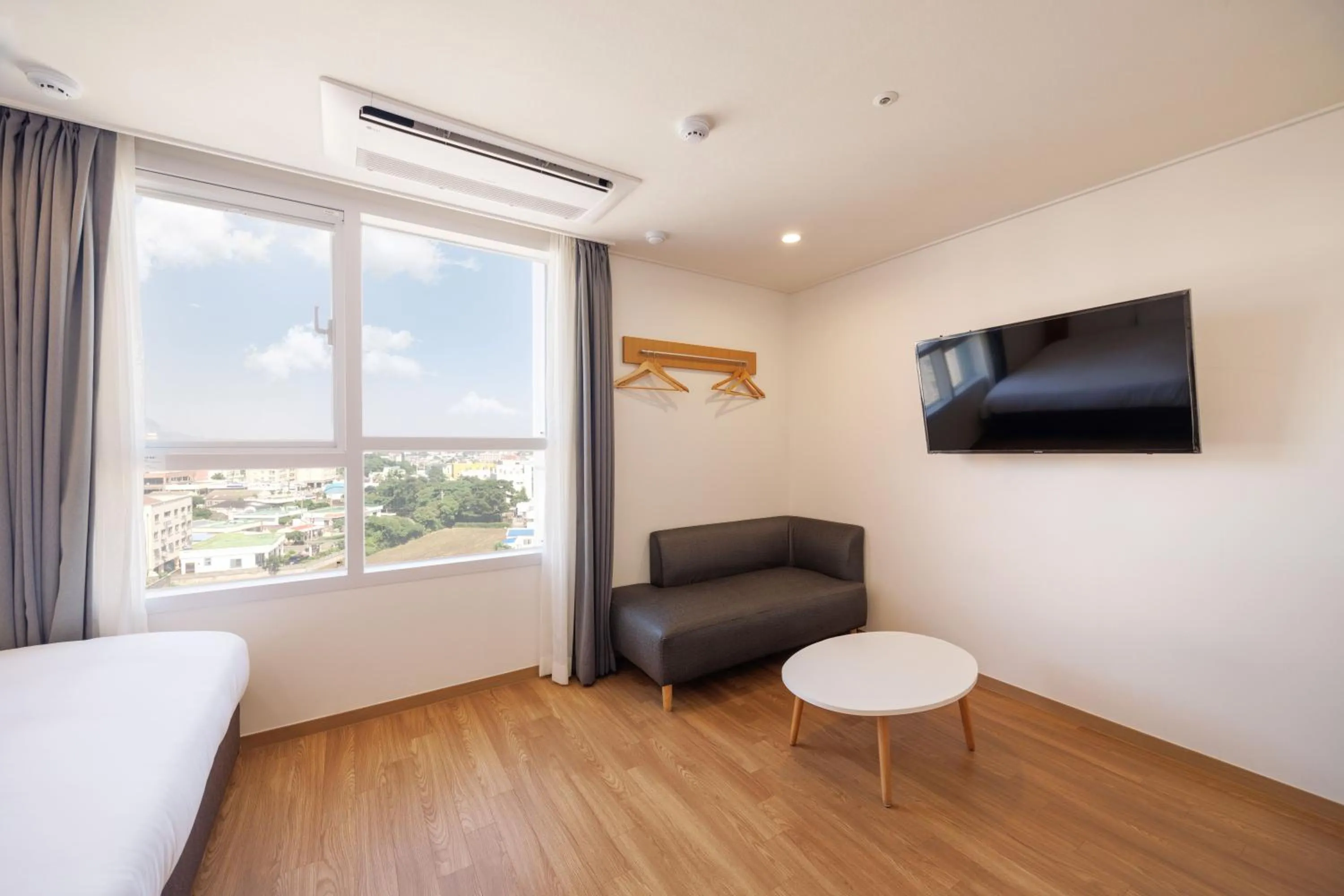 Bed in Kenny Stay Jeju Mosulpo