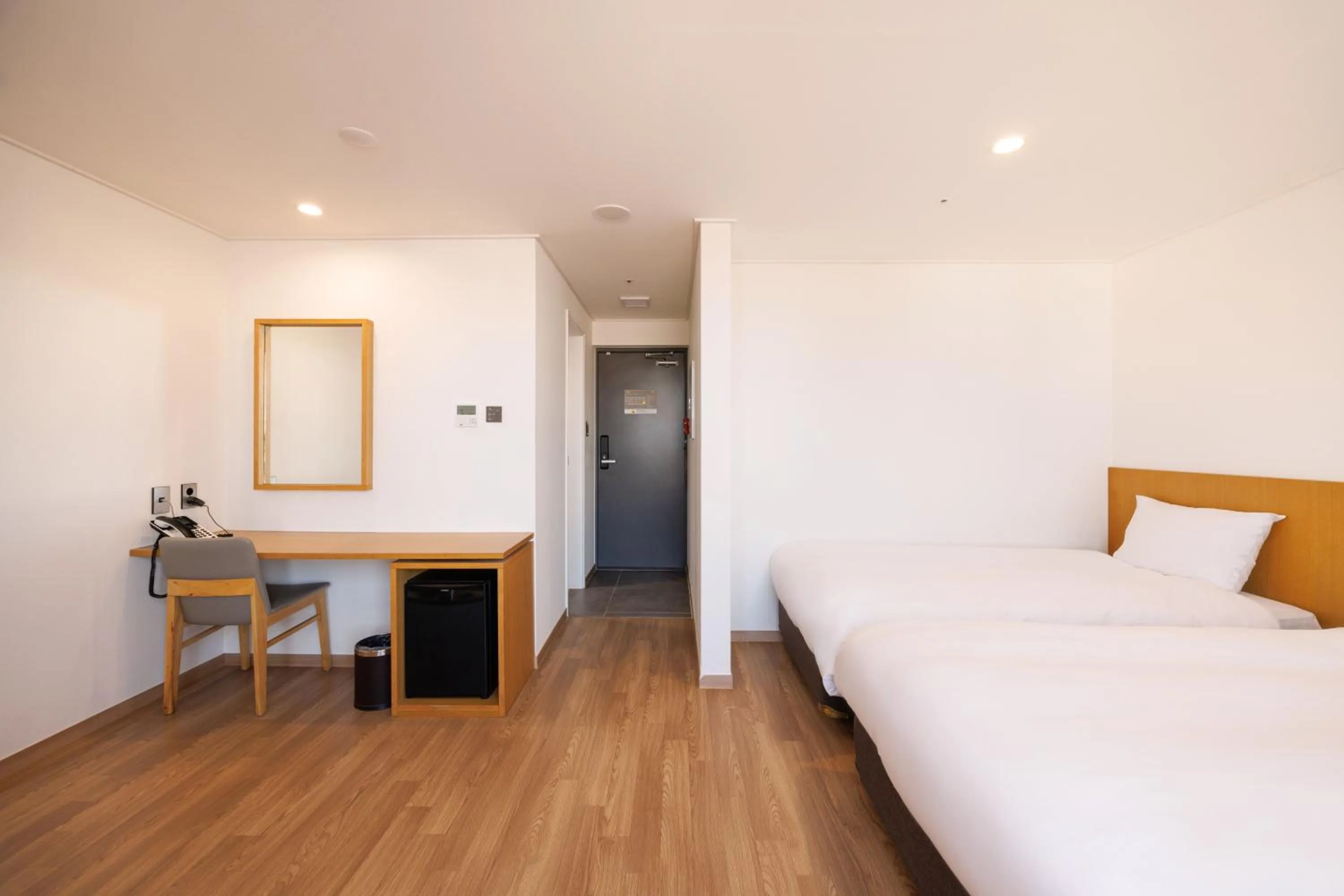 Bed in Kenny Stay Jeju Mosulpo