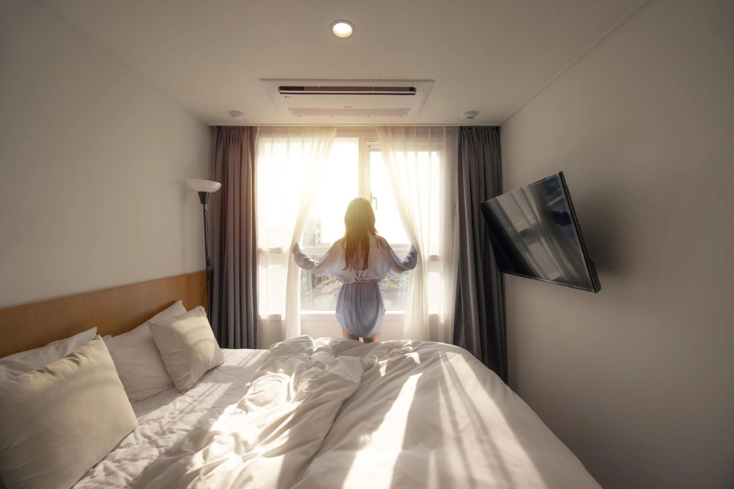 Bed in Kenny Stay Jeju Mosulpo