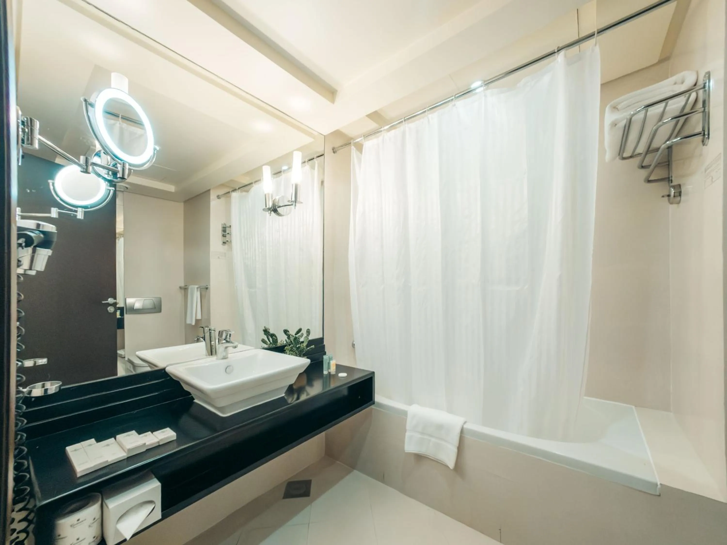 Bathroom in Kingsgate Hotel by Millennium