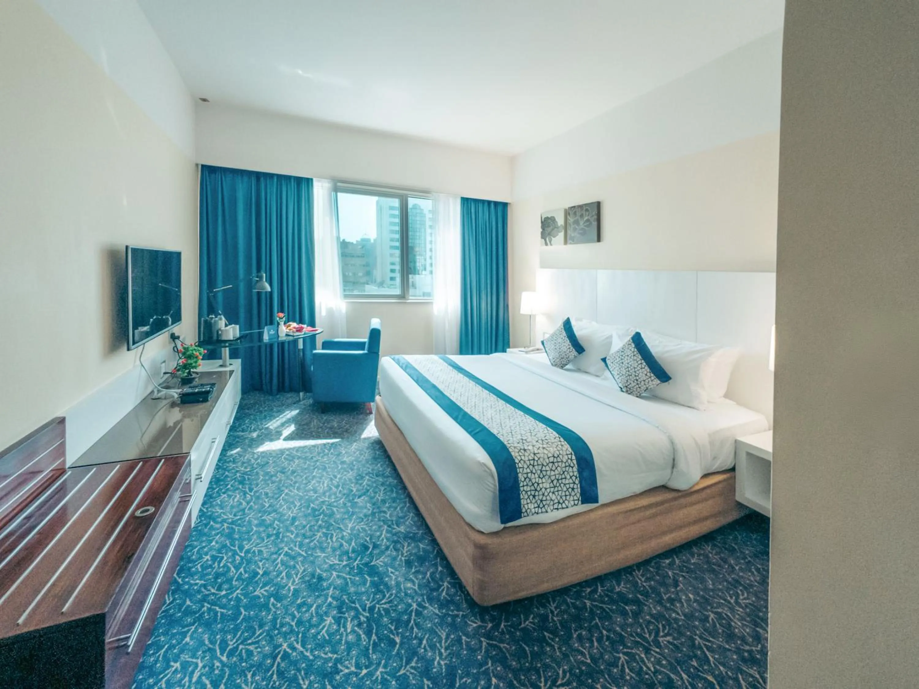 Bed in Kingsgate Hotel by Millennium