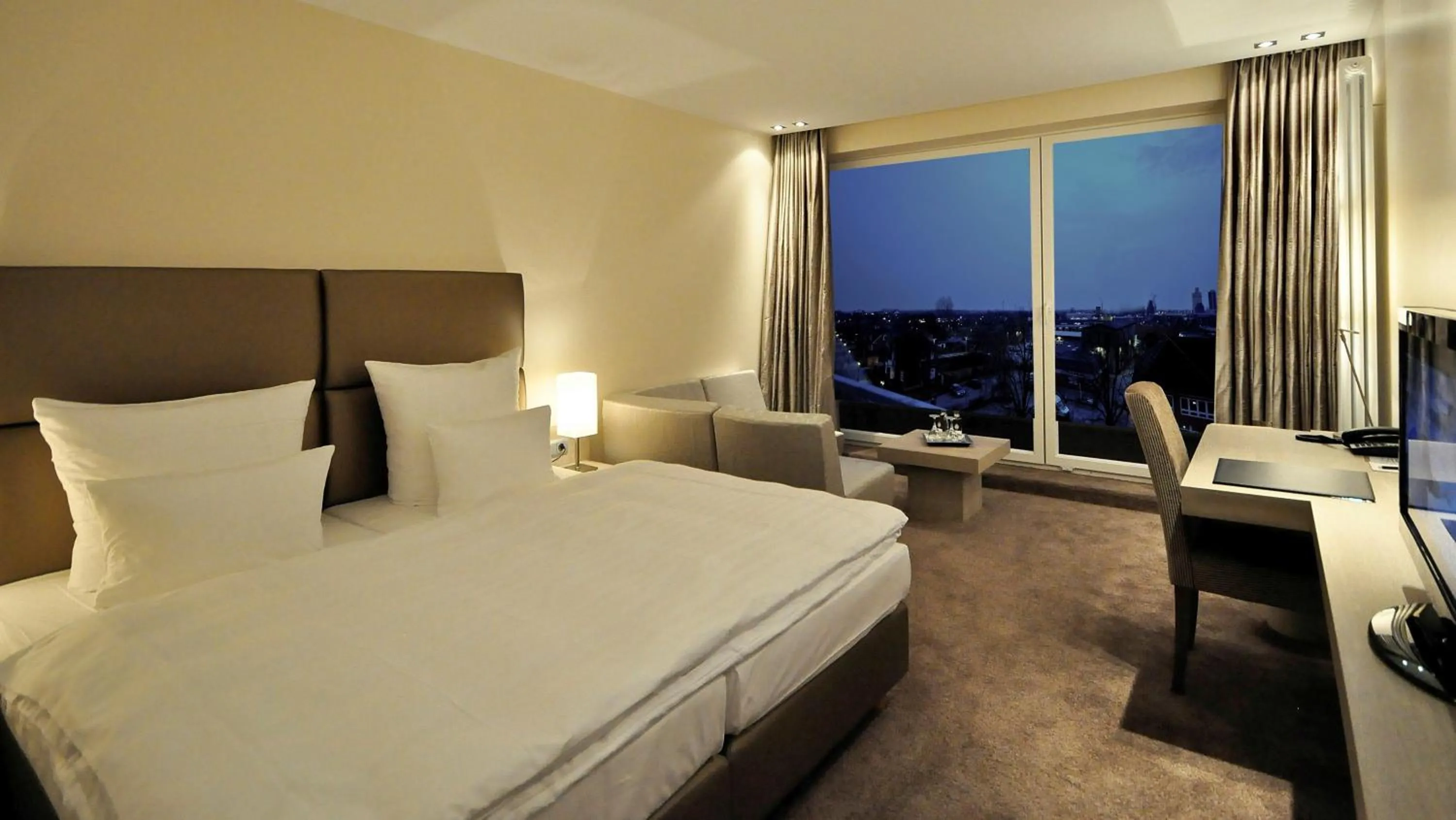 Bed in Thomas Hotel Spa & Lifestyle