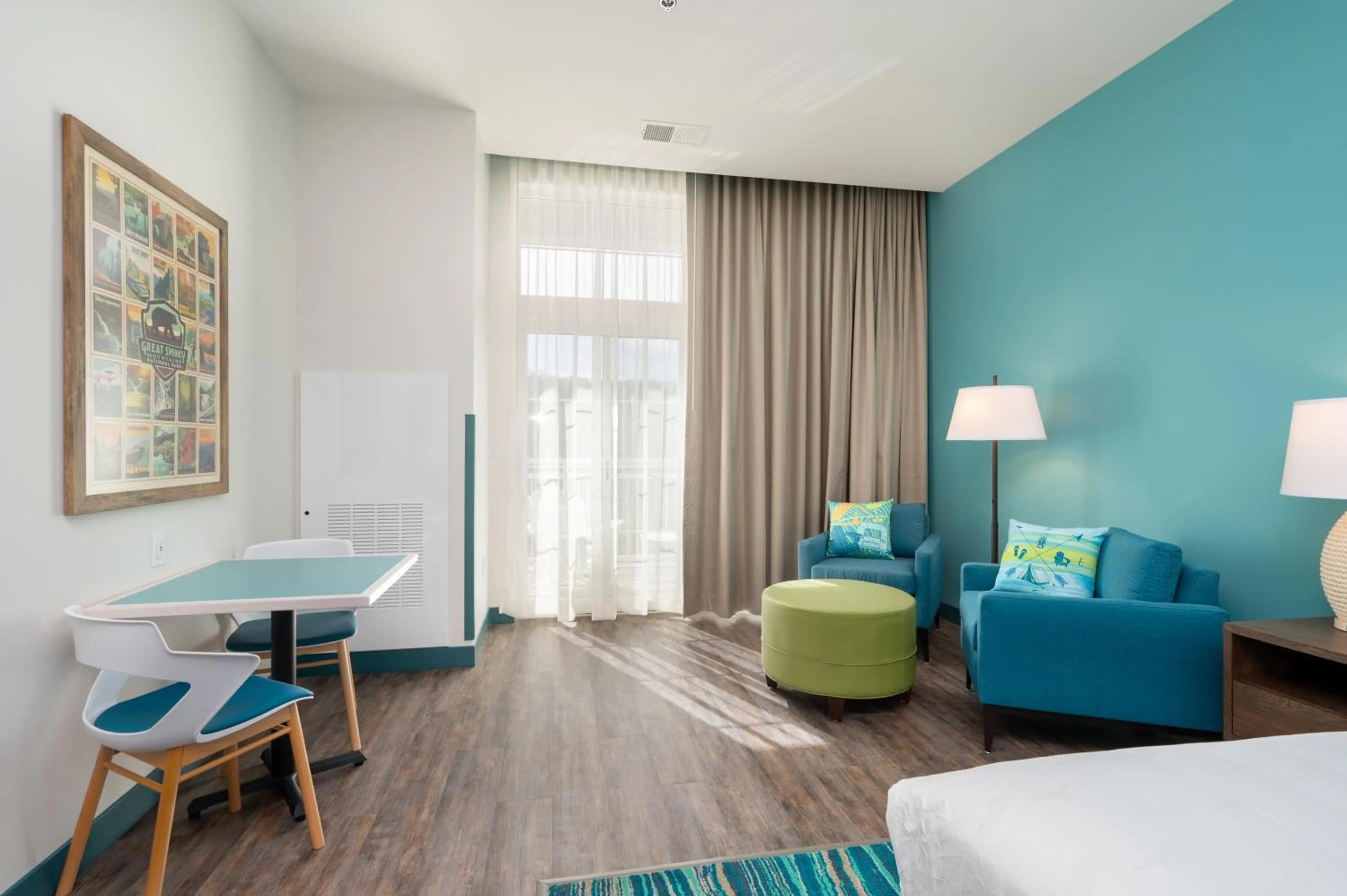 Seating area, Bed in The Lodge at Camp Margaritaville