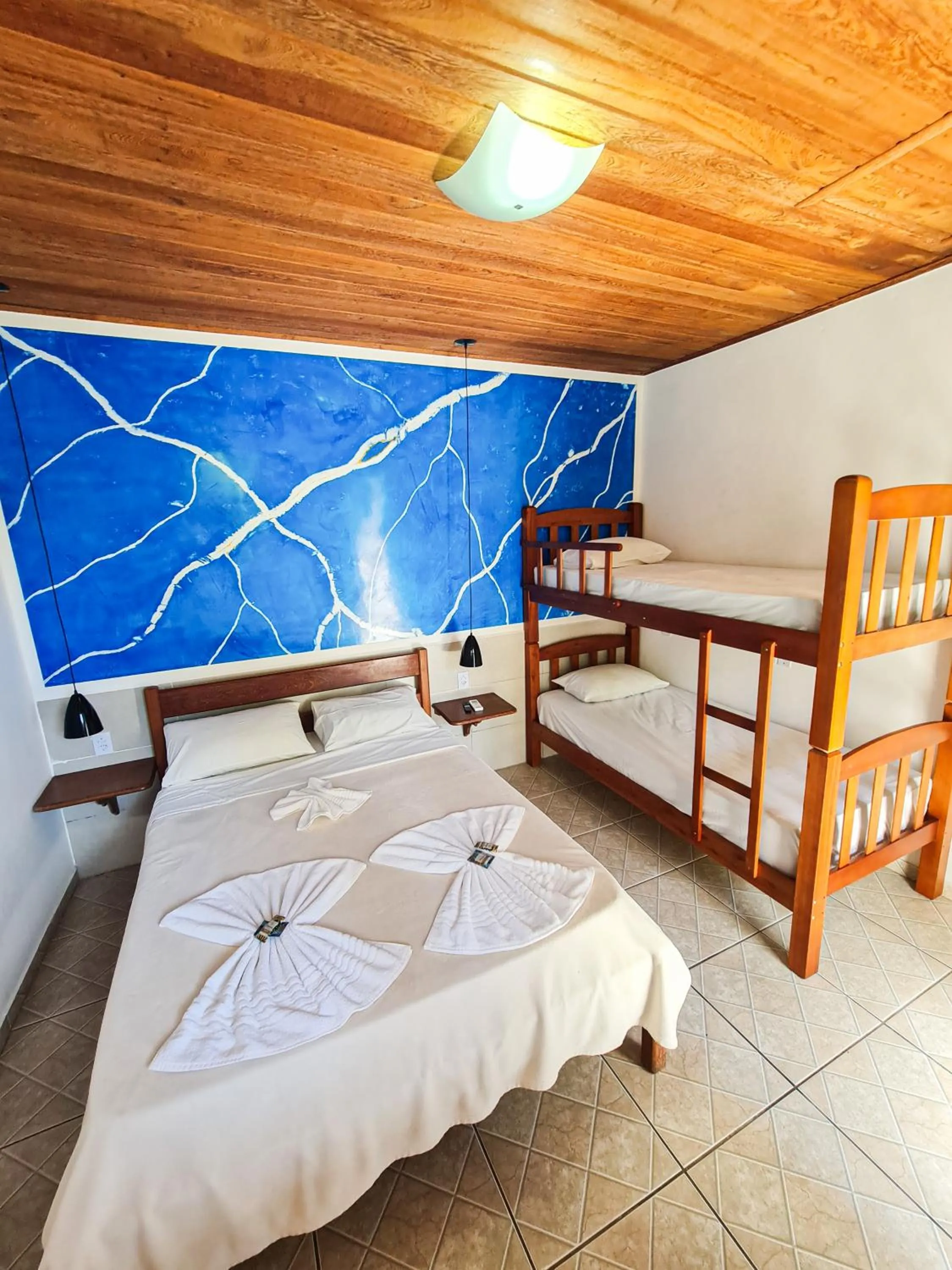 Bed in Pousada Bicho do Mar