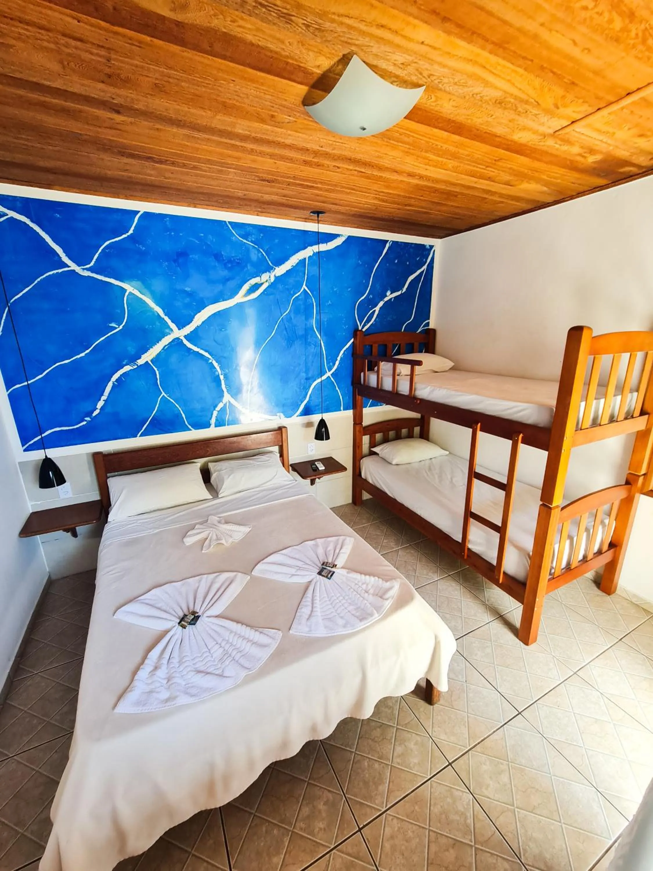 Bed in Pousada Bicho do Mar