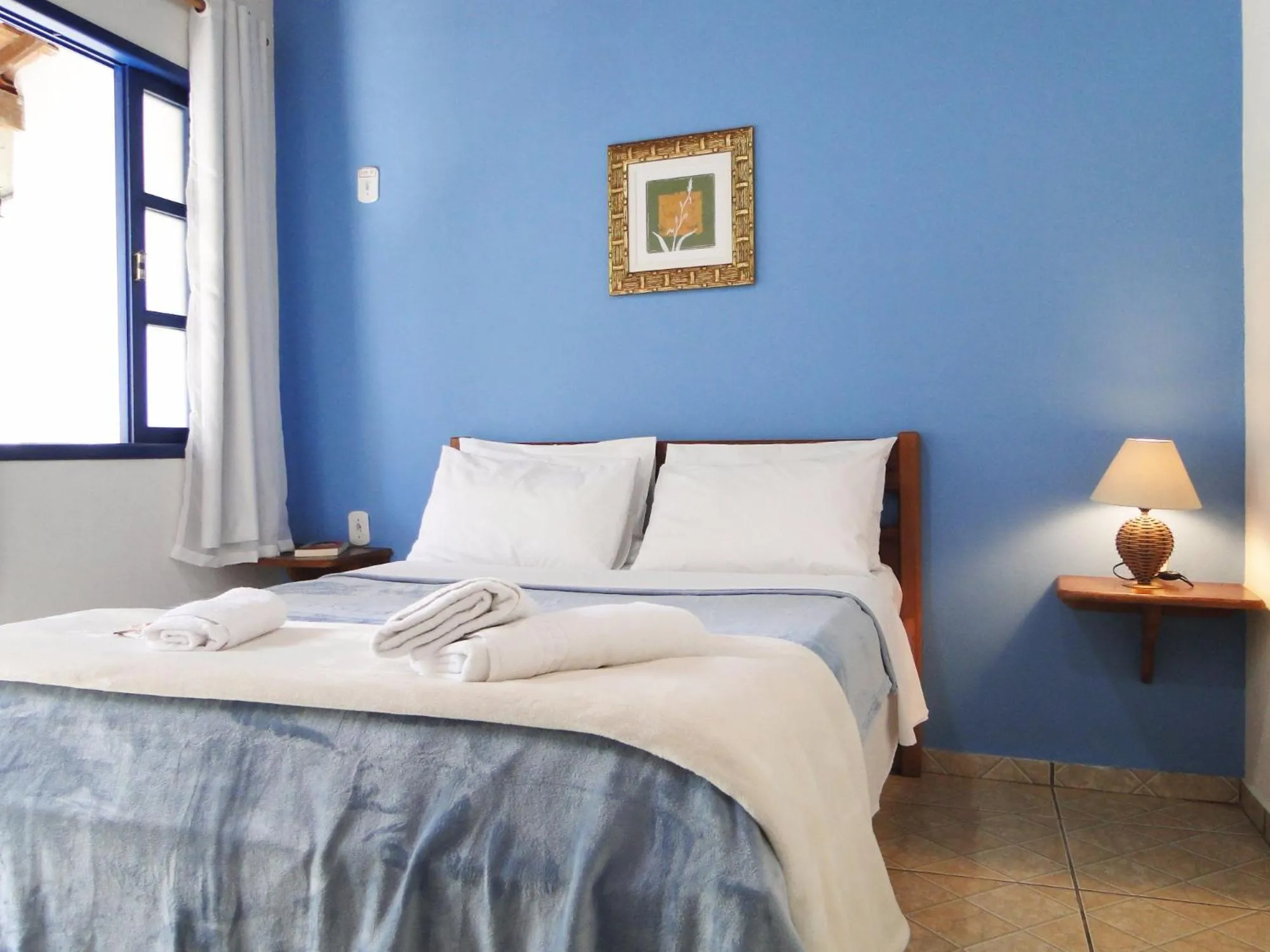 Bed in Pousada Bicho do Mar