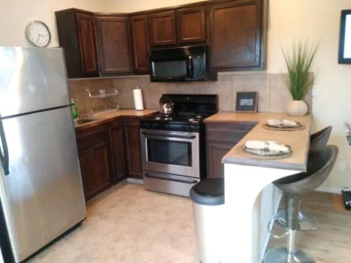 Kitchen or kitchenette in Corporate Manor