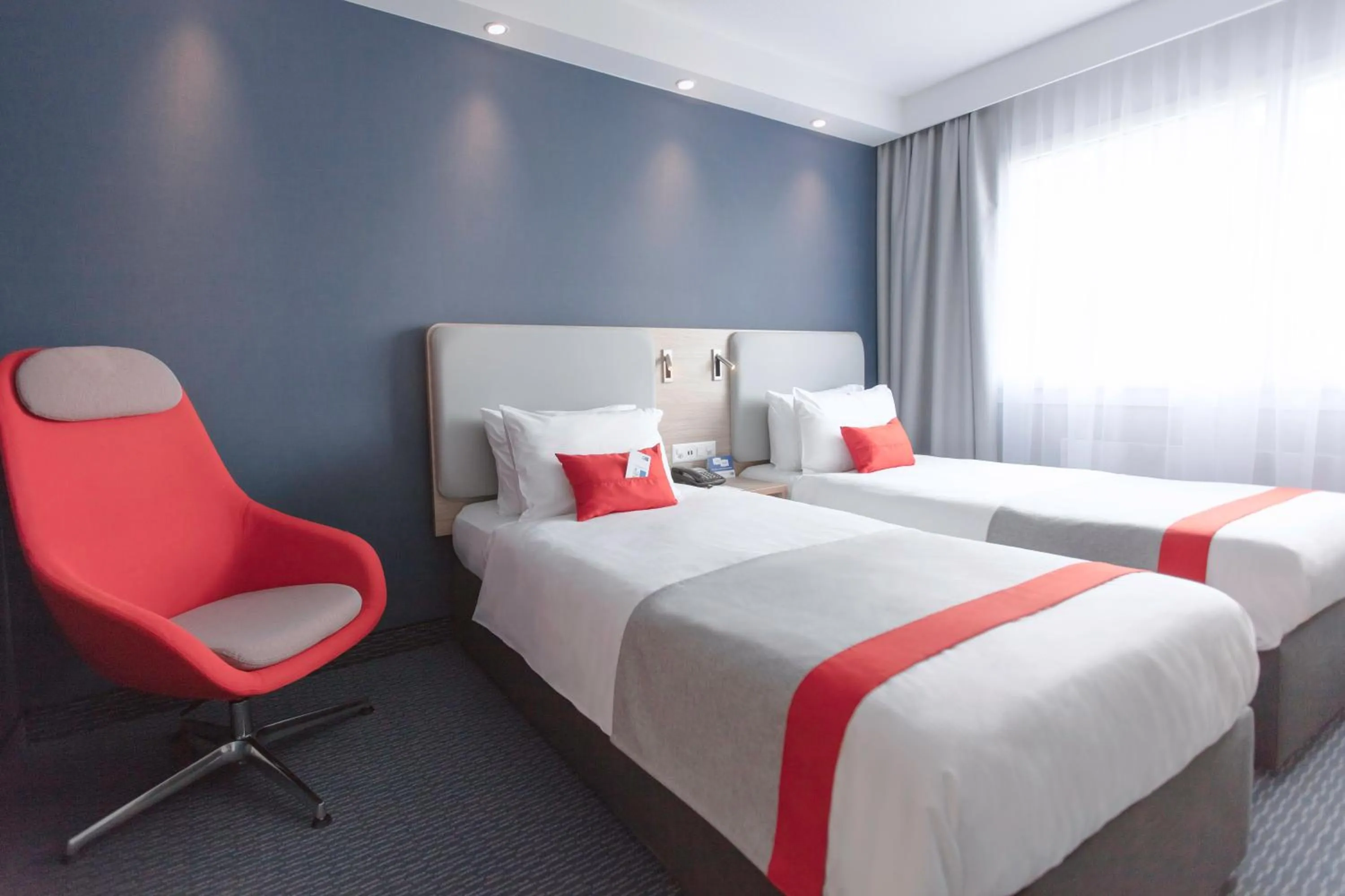 Photo of the whole room, Bed in Holiday Inn Express Luzern-Neuenkirch by IHG