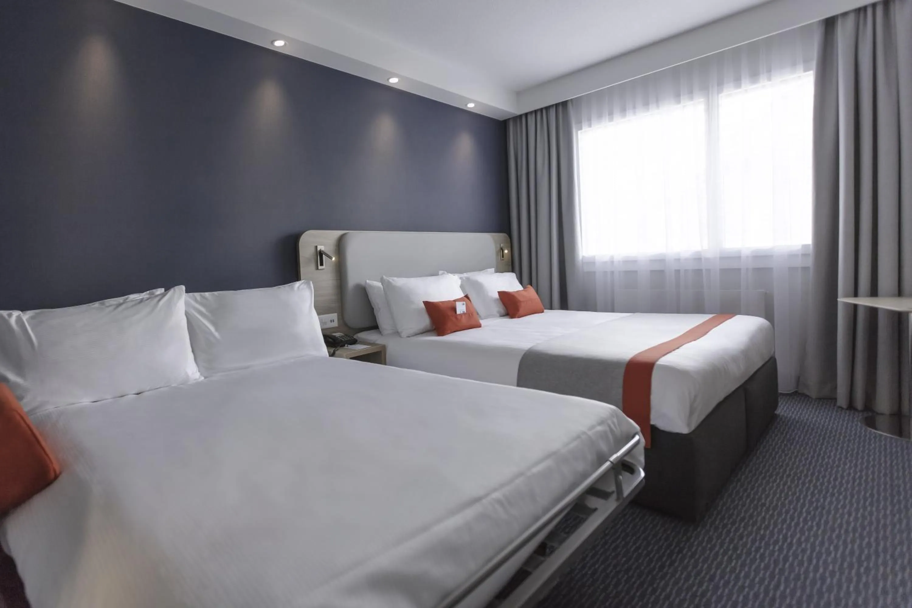 Photo of the whole room, Bed in Holiday Inn Express Luzern-Neuenkirch by IHG