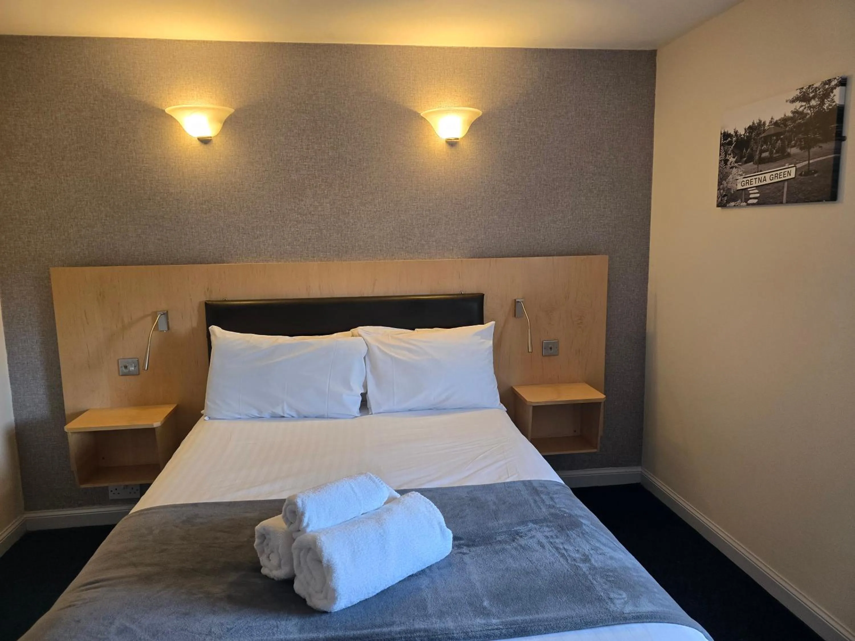 Bed in The Mill Forge Hotel