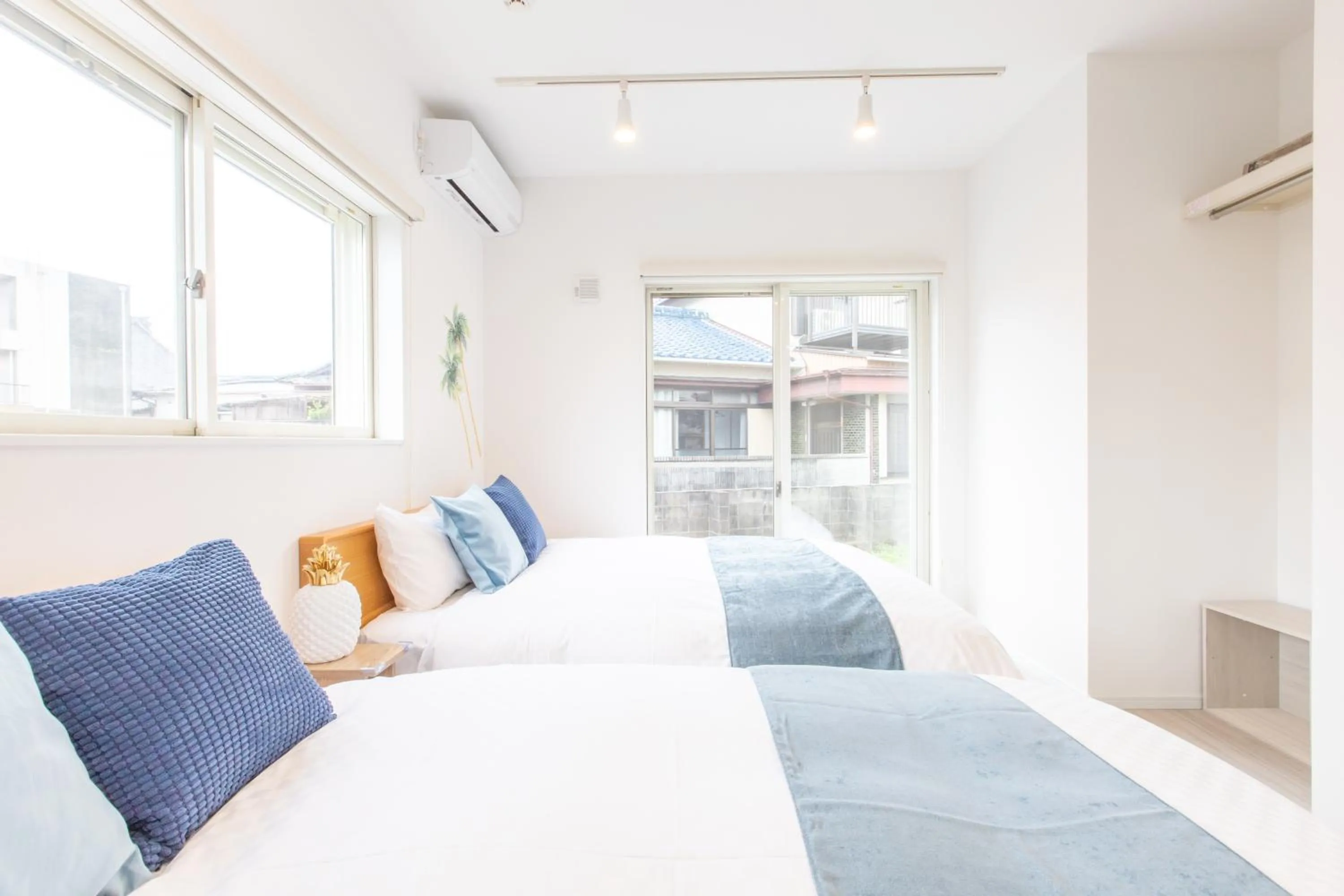 Bed in West Coast Villa Shirahama