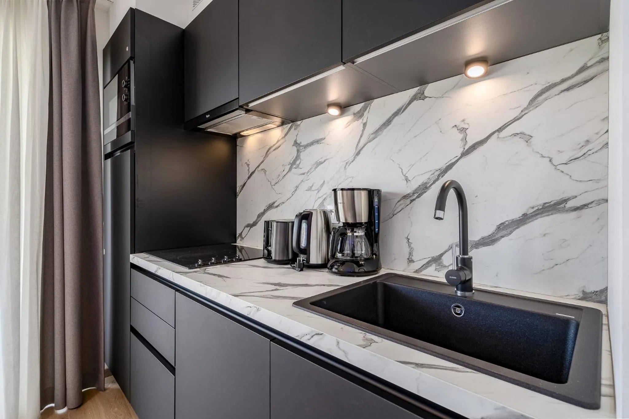 Kitchen or kitchenette in Evancy Trésors d'Opale