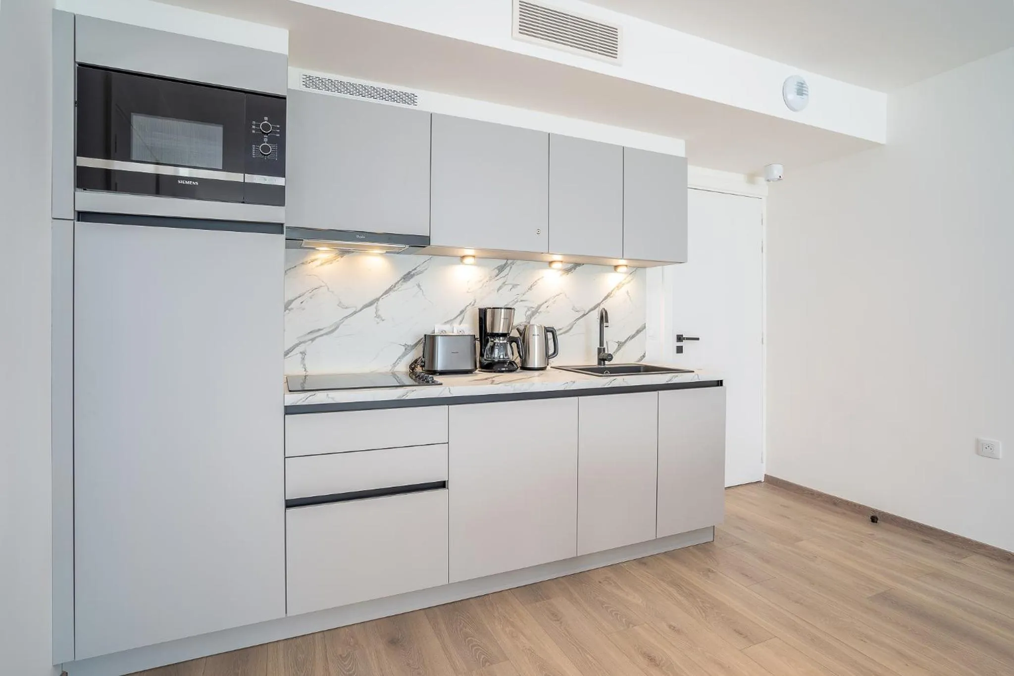 Kitchen or kitchenette in Evancy Trésors d'Opale