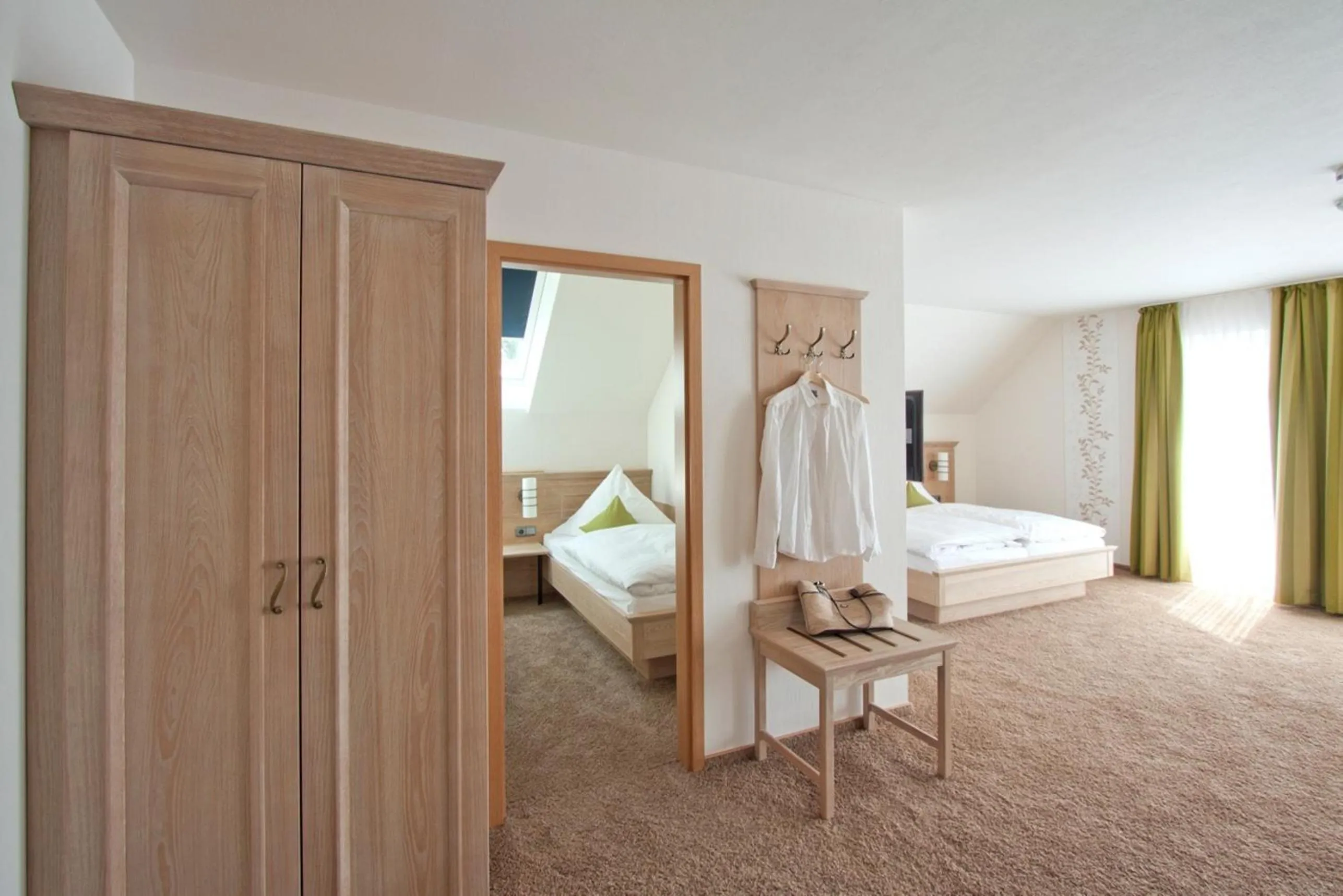 Photo of the whole room, Bed in Landhotel Teuteberg