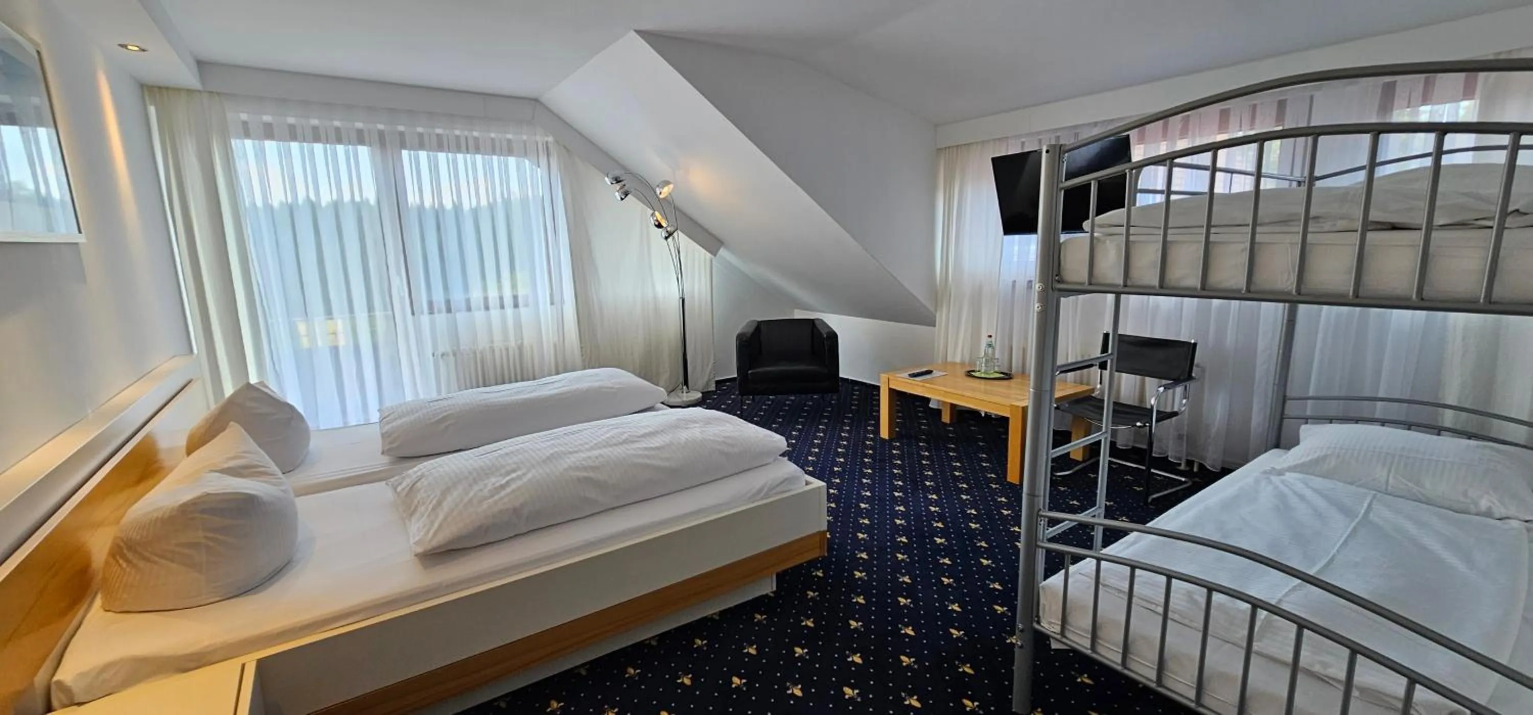 Photo of the whole room, Bed in Schwaben Resort Ebnisee