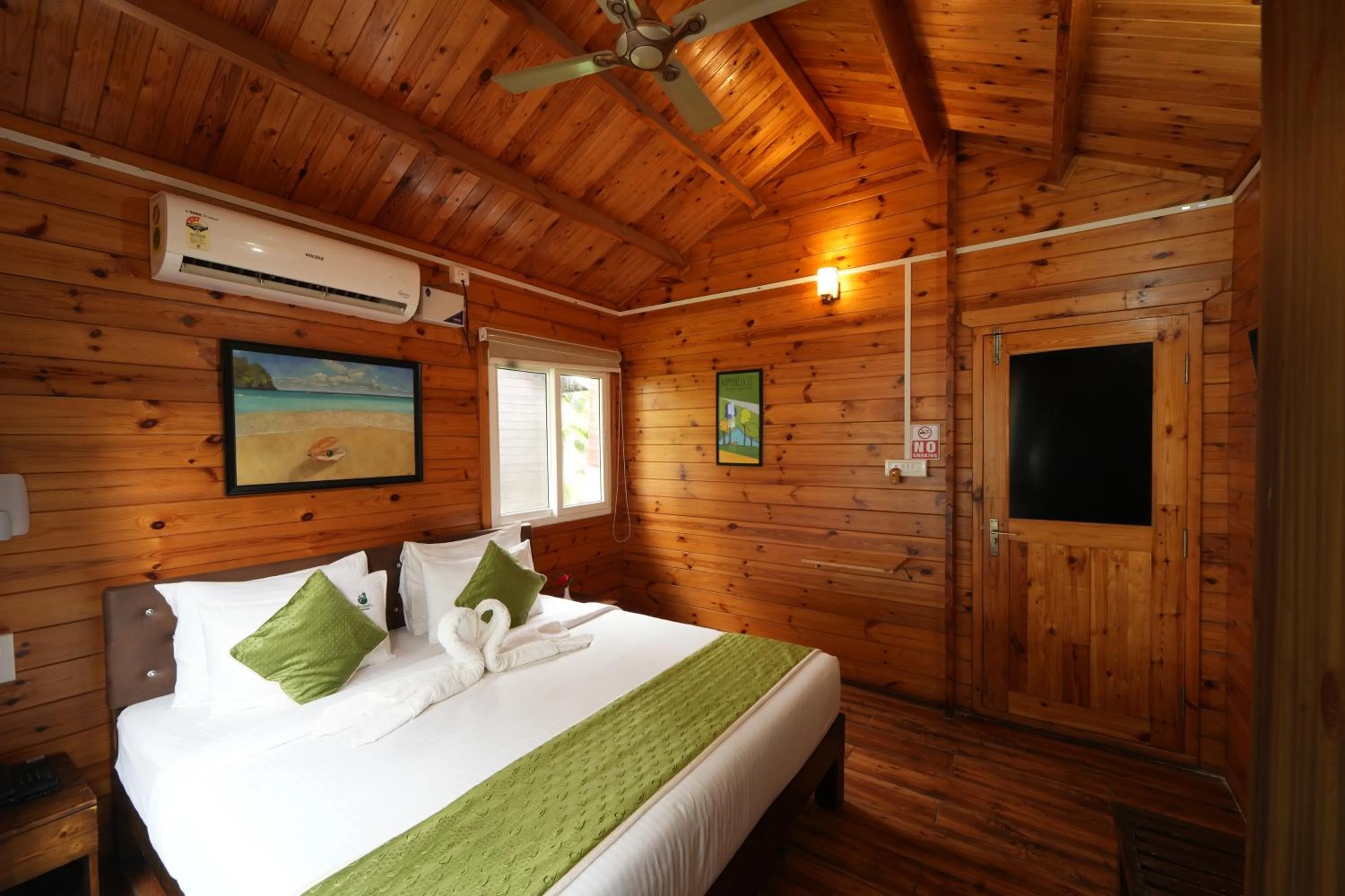 Bed in Adhvasaha Beach Spa Resort