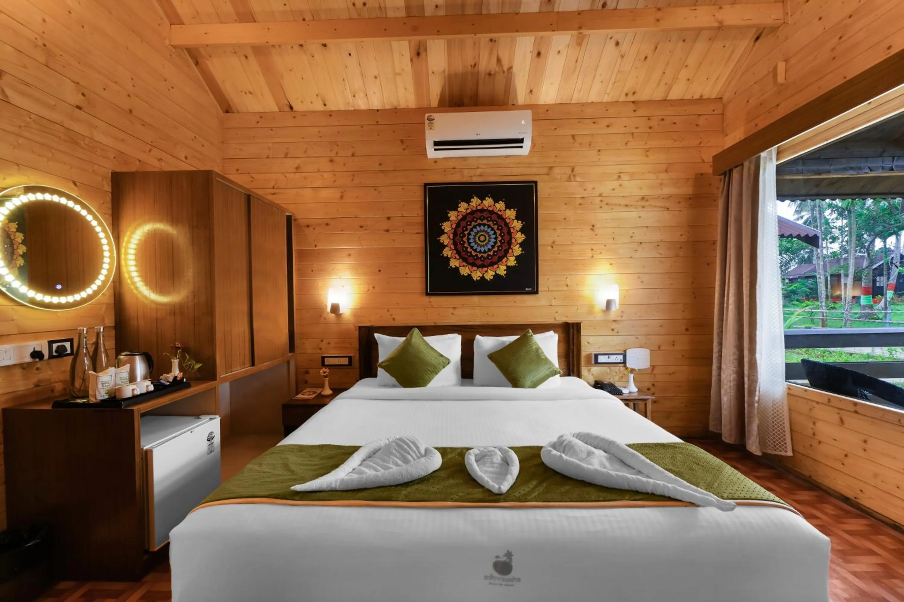 Bed in Adhvasaha Beach Spa Resort