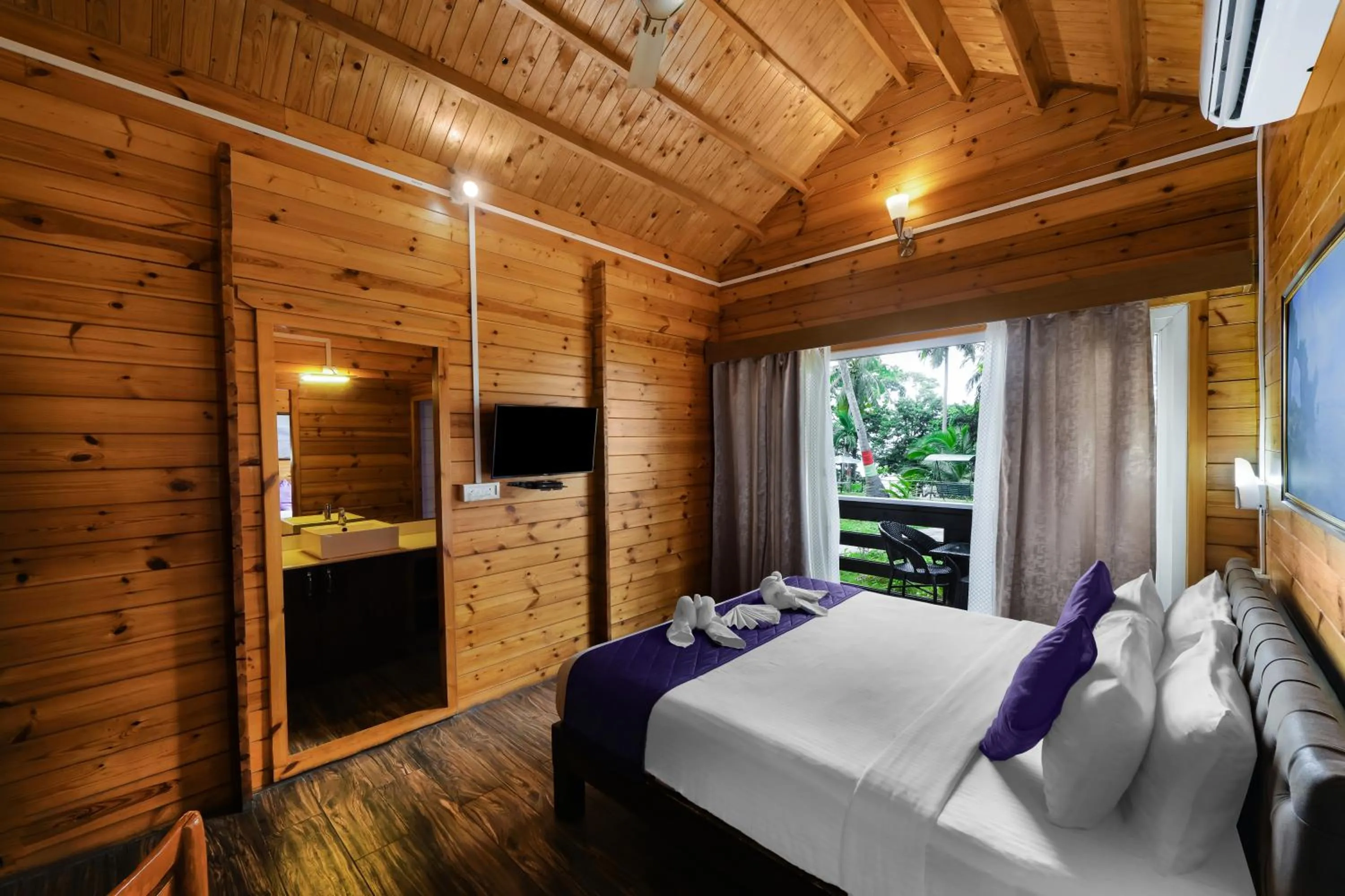 Bed in Adhvasaha Beach Spa Resort