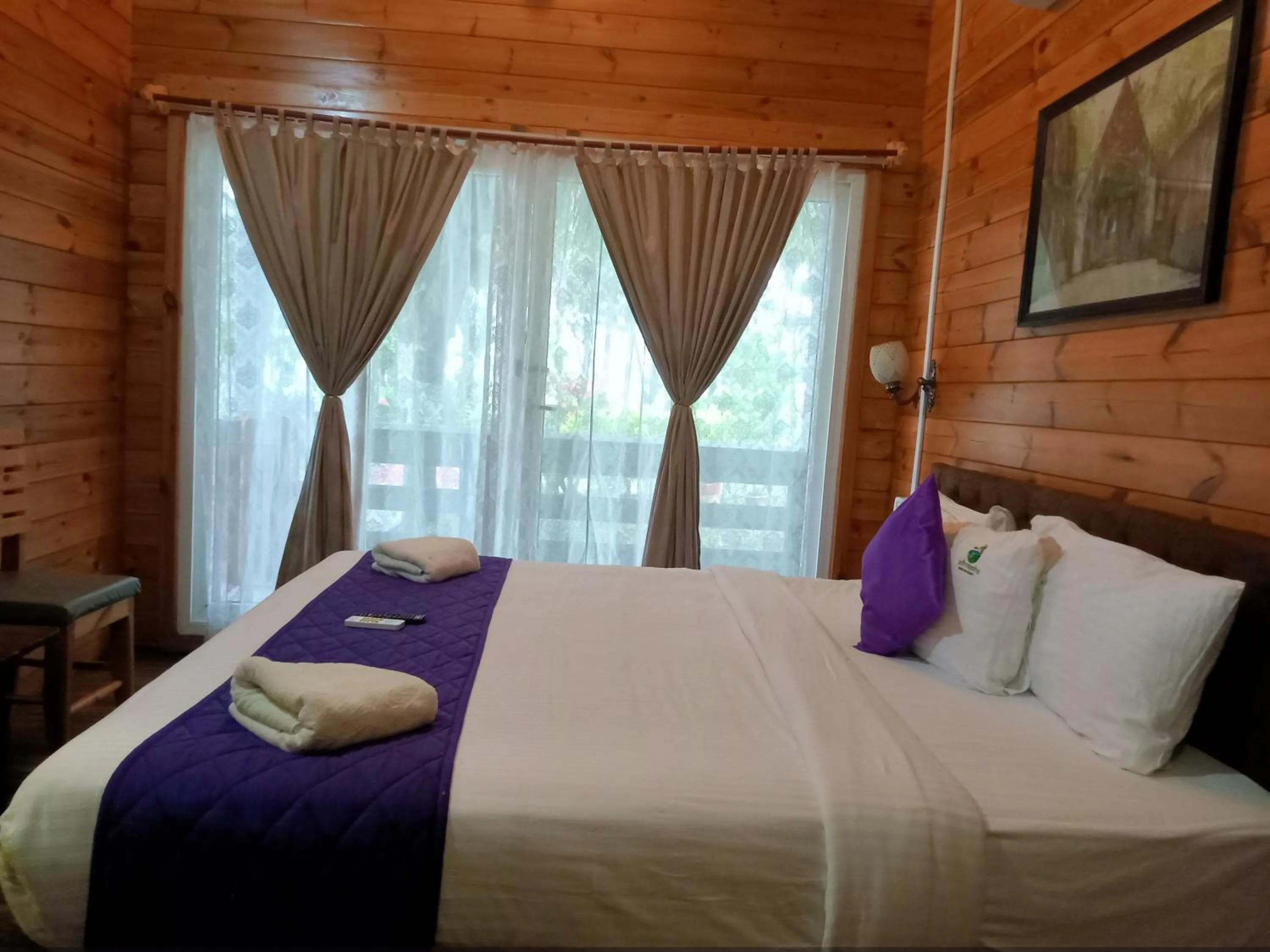 Bed in Adhvasaha Beach Spa Resort