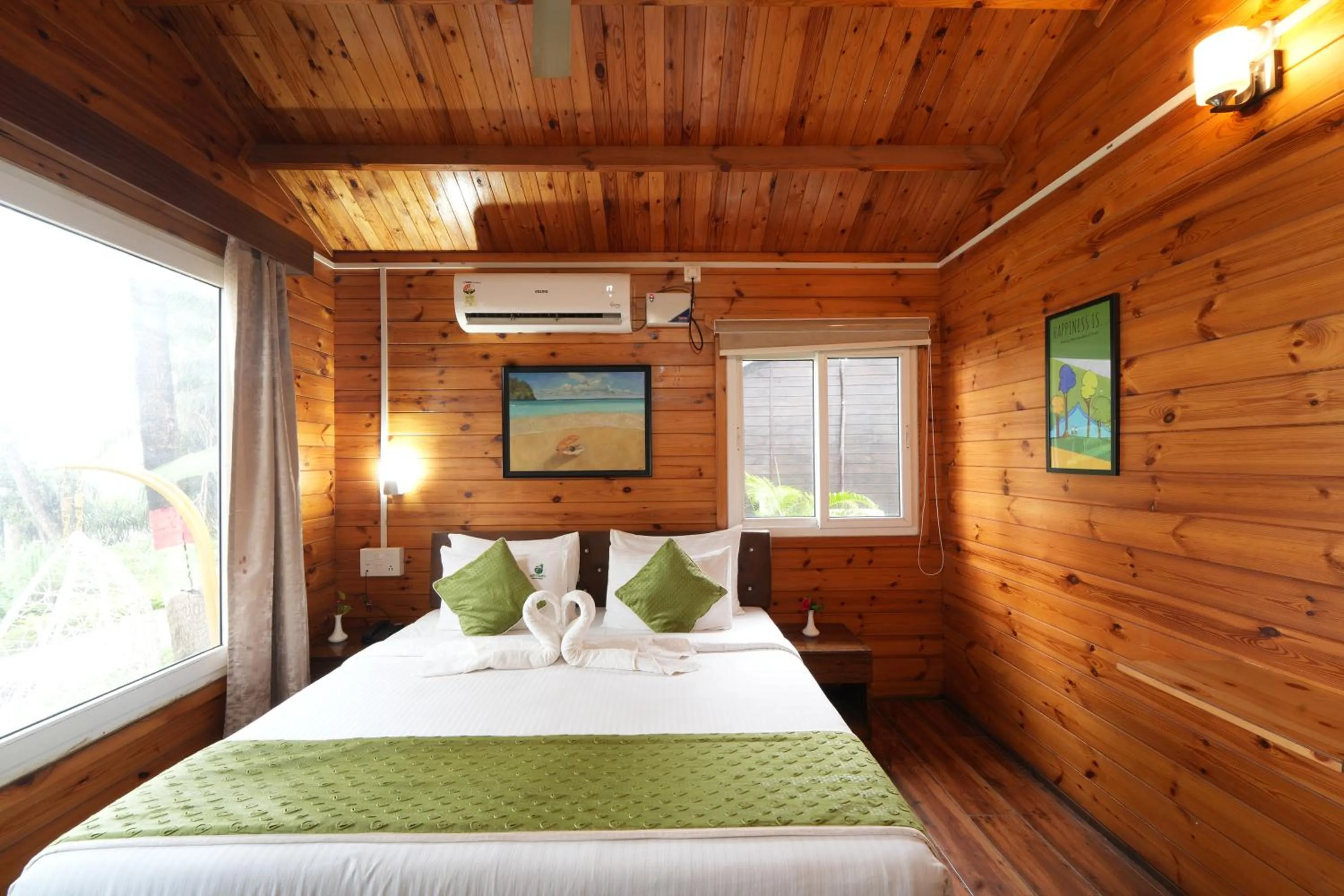 Bed in Adhvasaha Beach Spa Resort