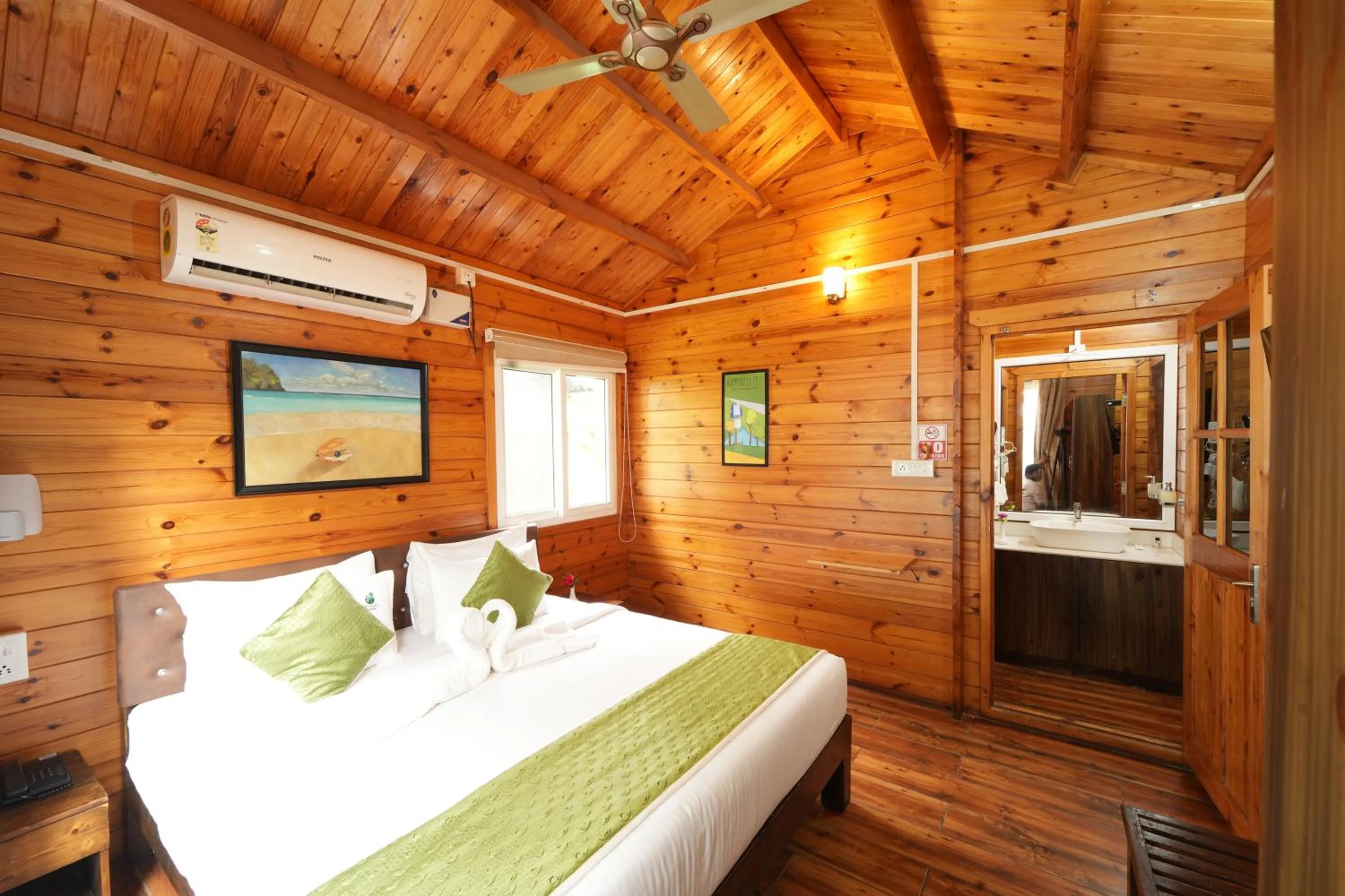 Bed in Adhvasaha Beach Spa Resort