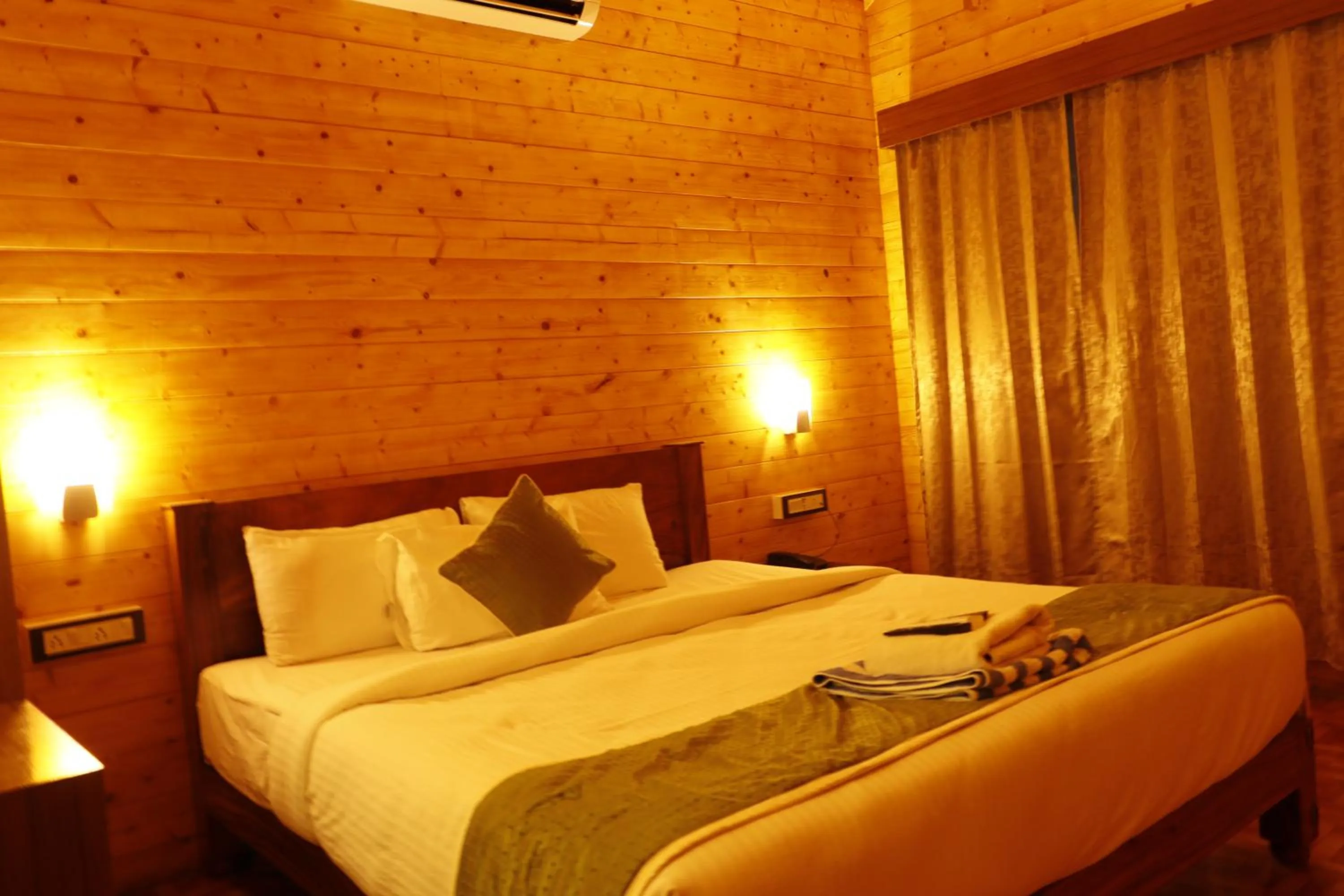 Bed in Adhvasaha Beach Spa Resort