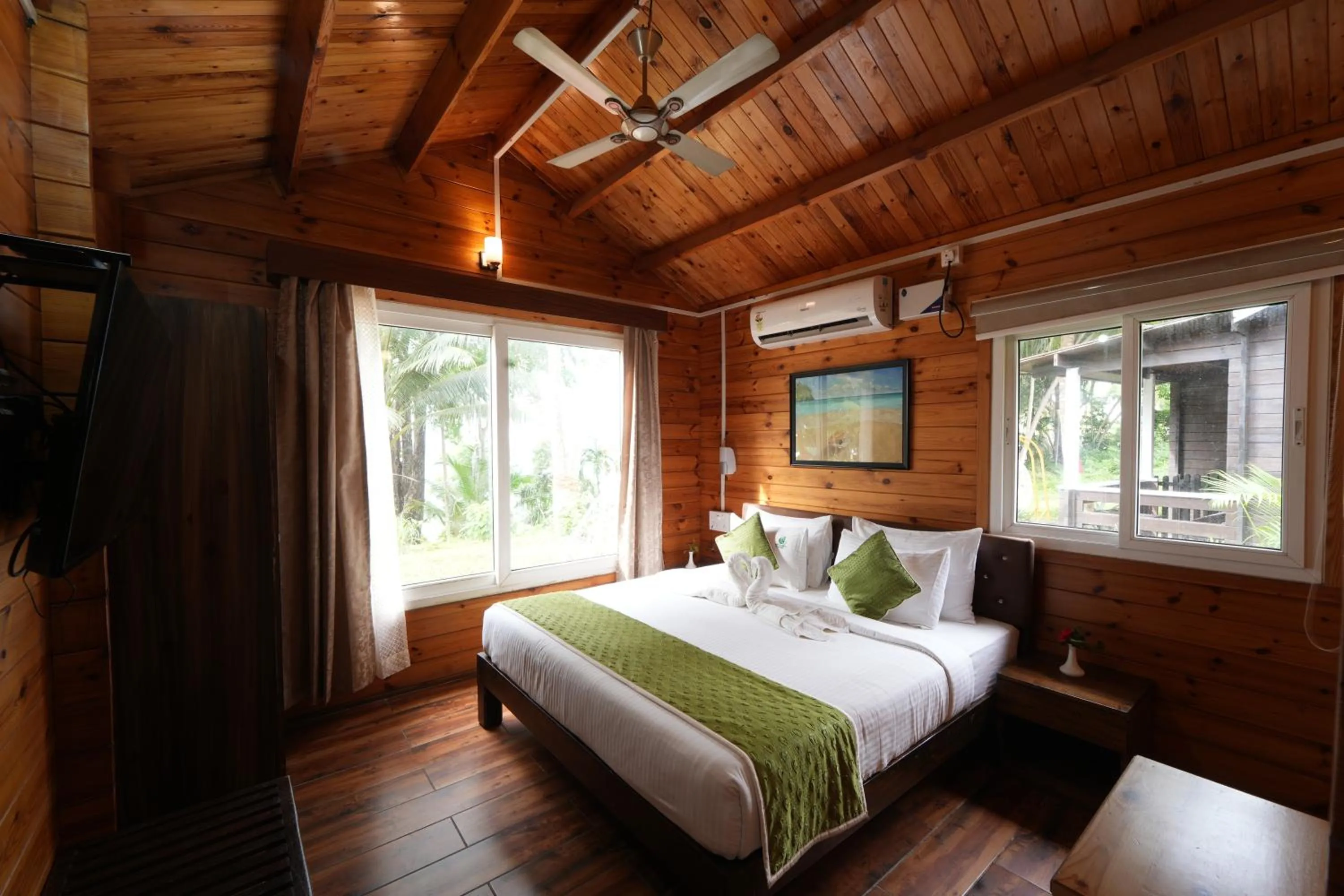 Bed in Adhvasaha Beach Spa Resort