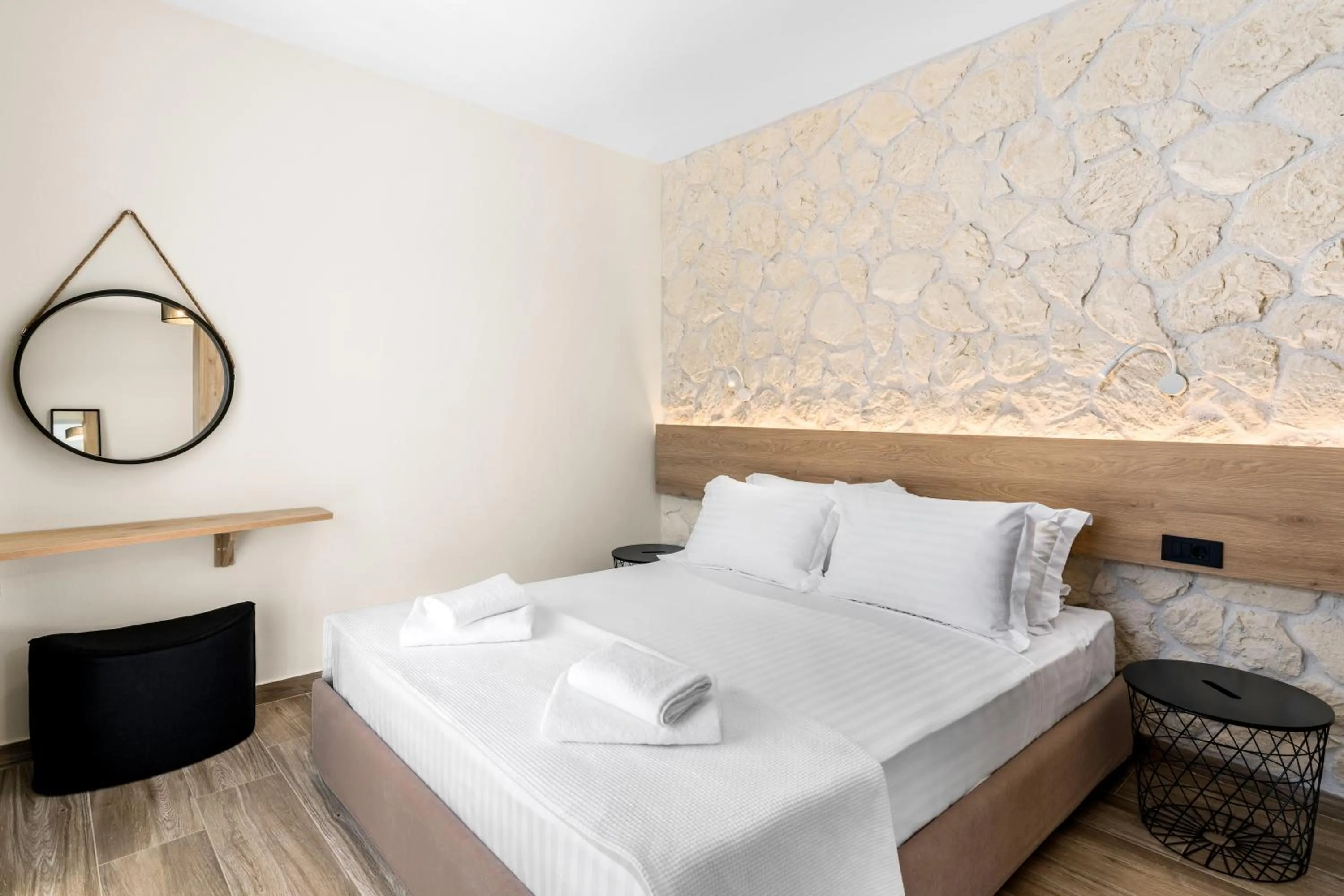 Bed in Sigma Luxury Rooms