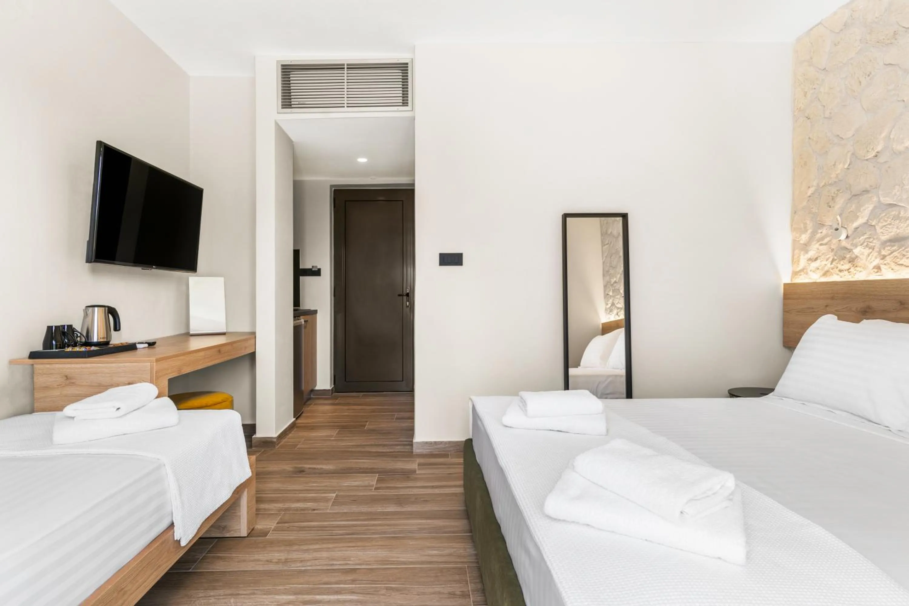 Bed in Sigma Luxury Rooms