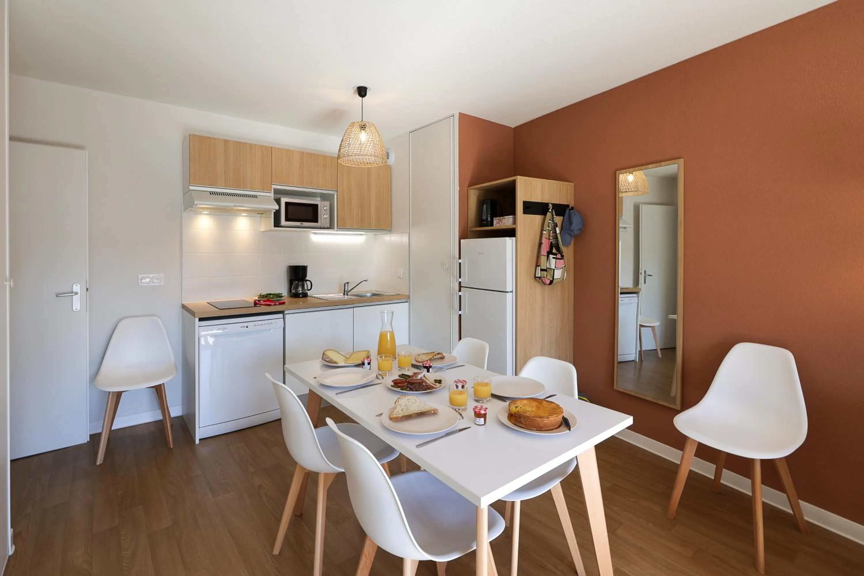 Kitchen or kitchenette in Résidence Néméa Le Domaine d'Uhaina