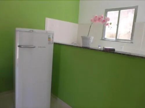 Kitchen or kitchenette in Pousada Flor de Liz