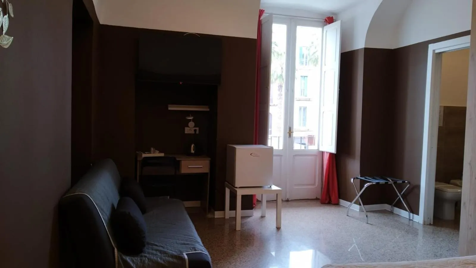 Bed in CconfortHotels Central Rooms