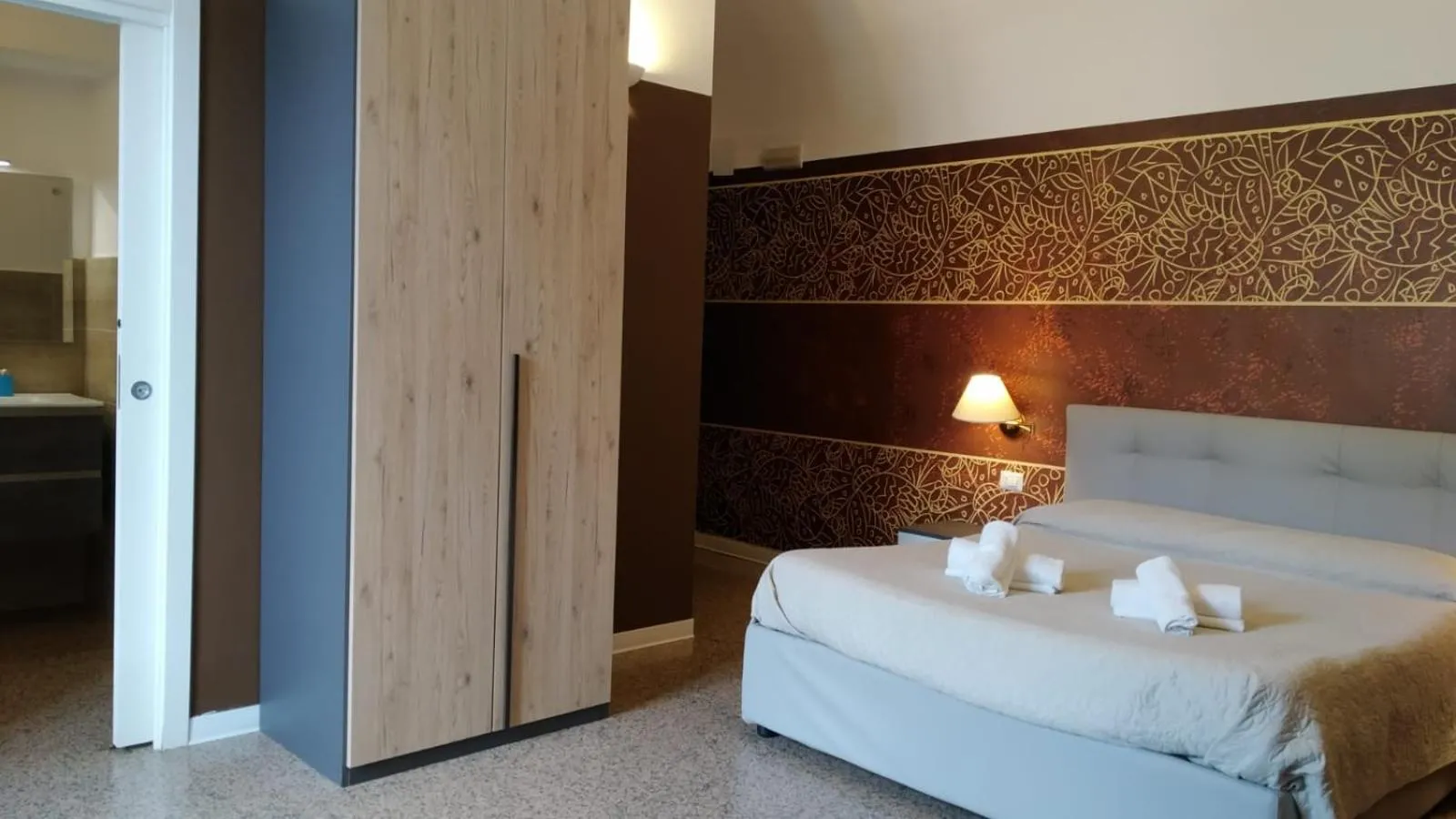 Bed in CconfortHotels Central Rooms