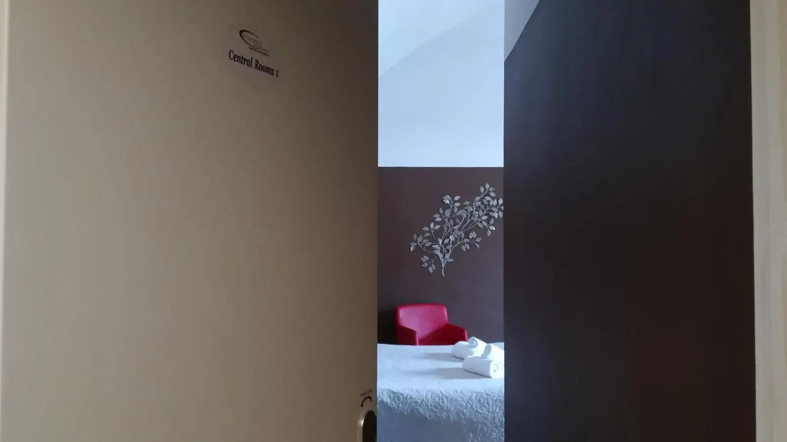 Bed in CconfortHotels Central Rooms