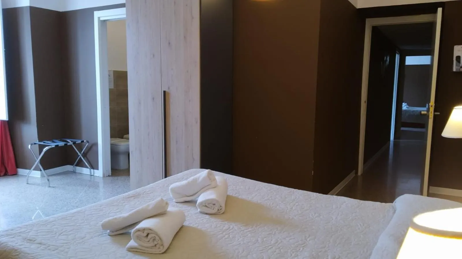 Bed in CconfortHotels Central Rooms