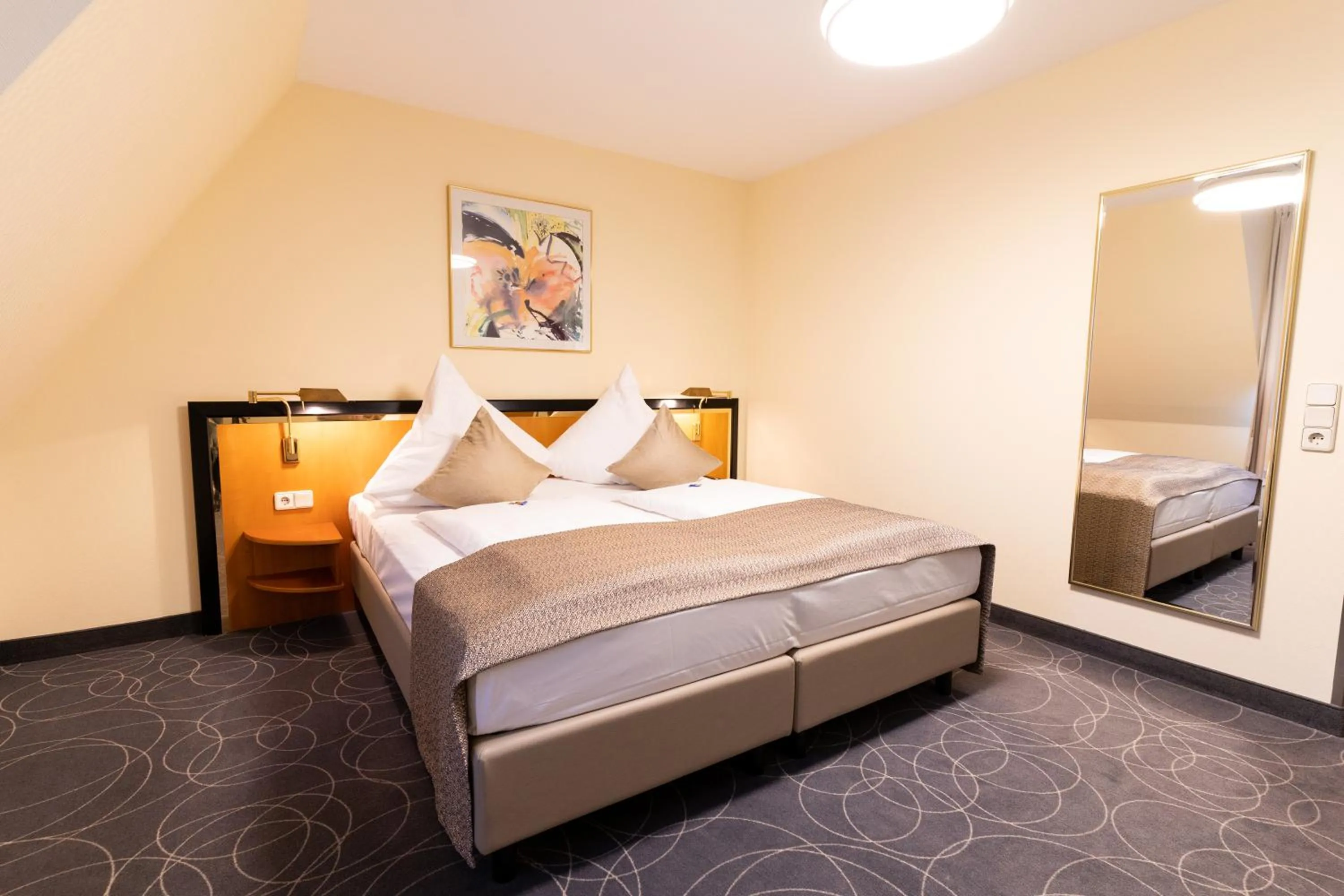 Bed in Hotel am Stadtgarten