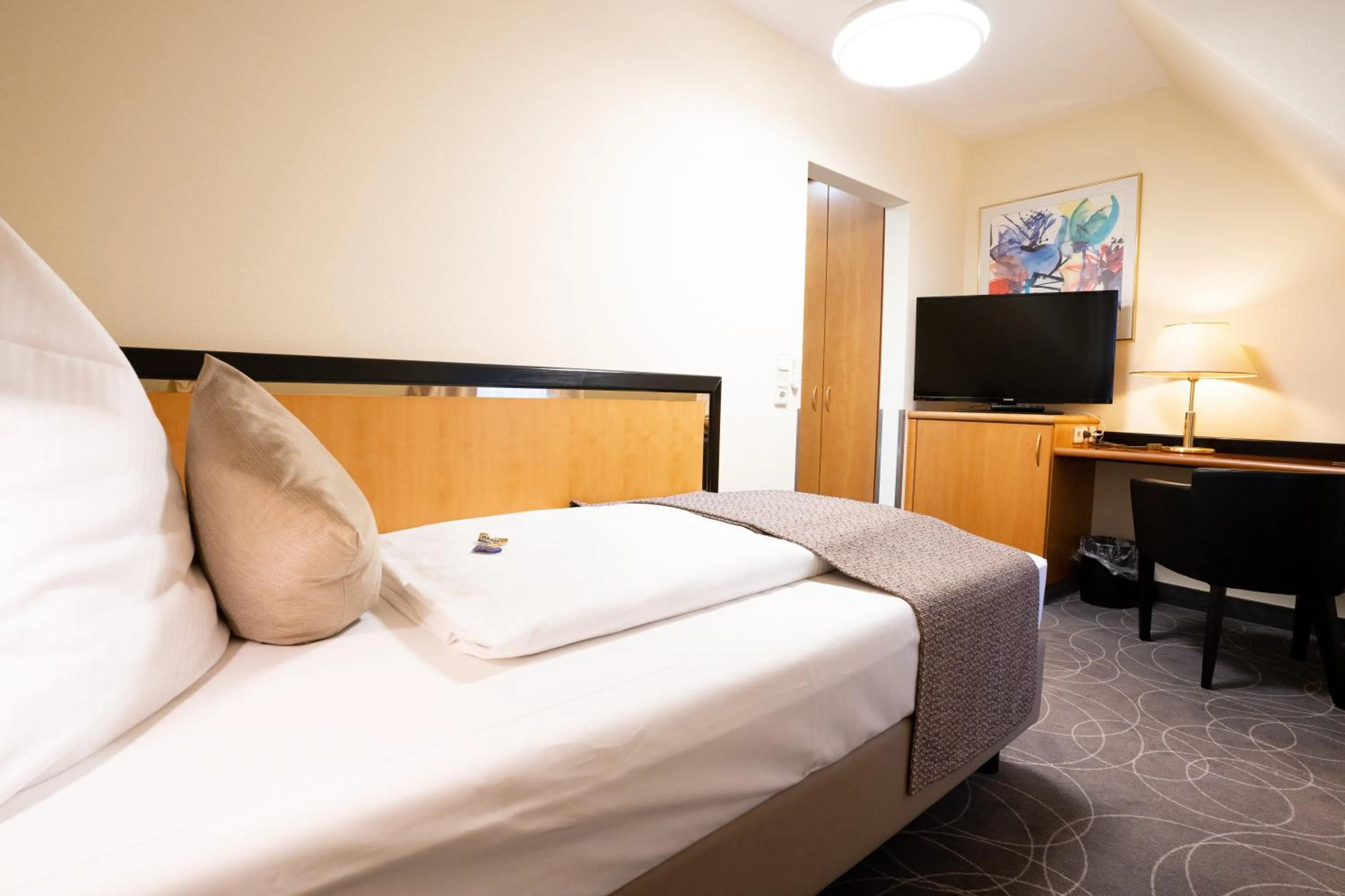 Bed in Hotel am Stadtgarten