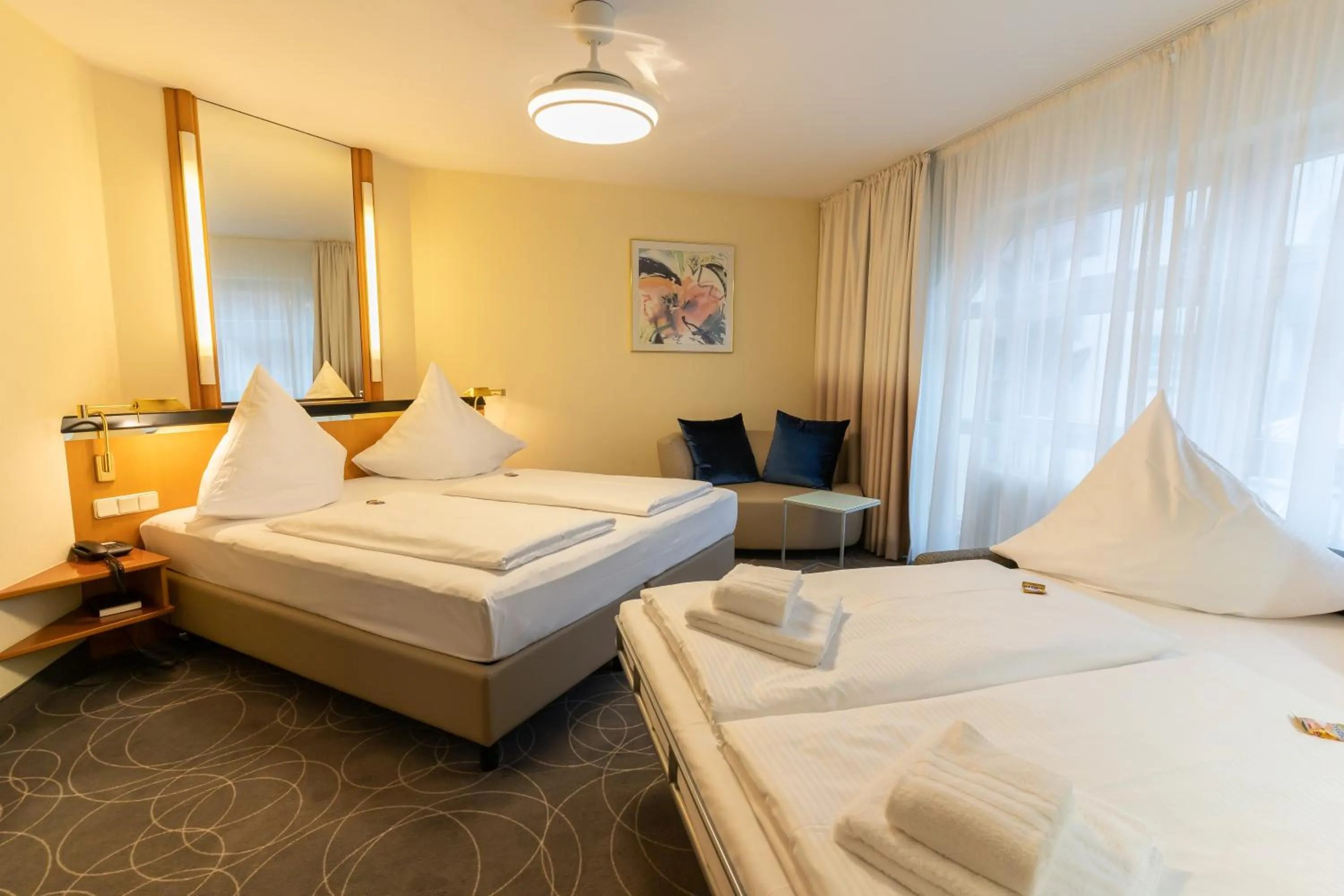 Bed in Hotel am Stadtgarten