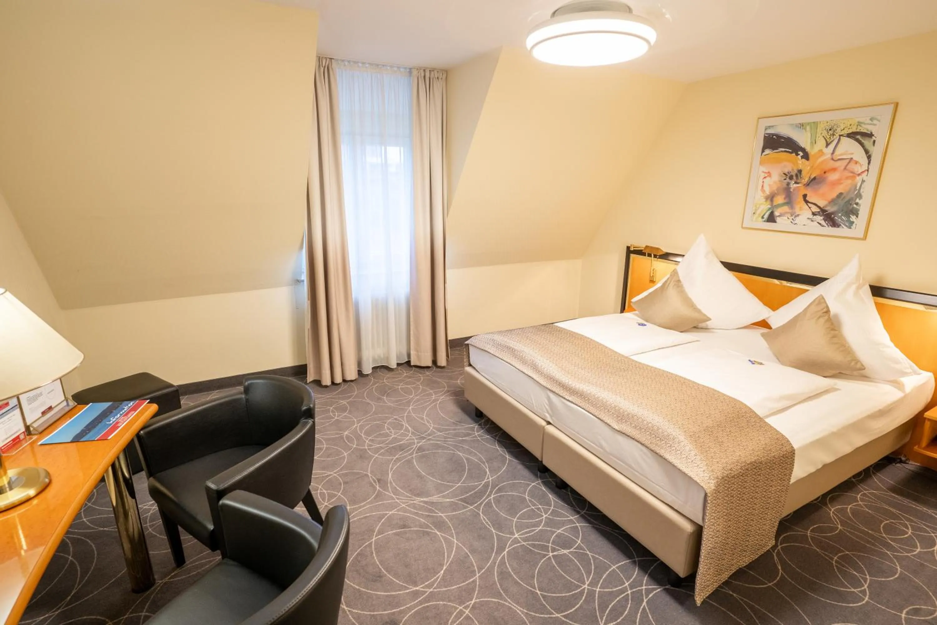 Bed in Hotel am Stadtgarten