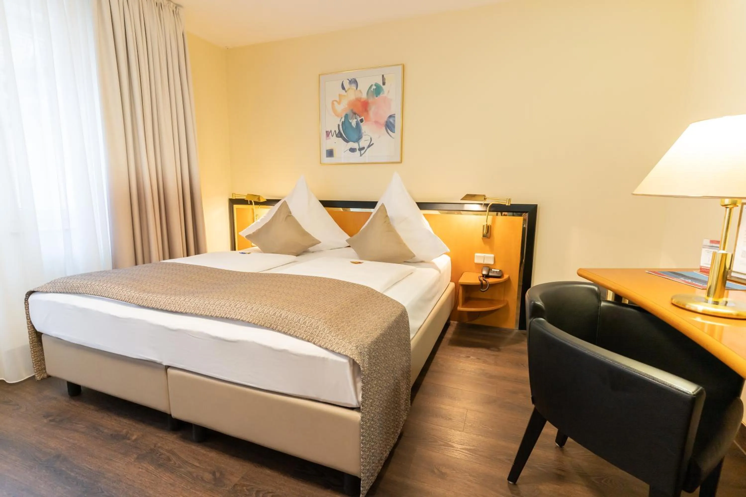 Bed in Hotel am Stadtgarten