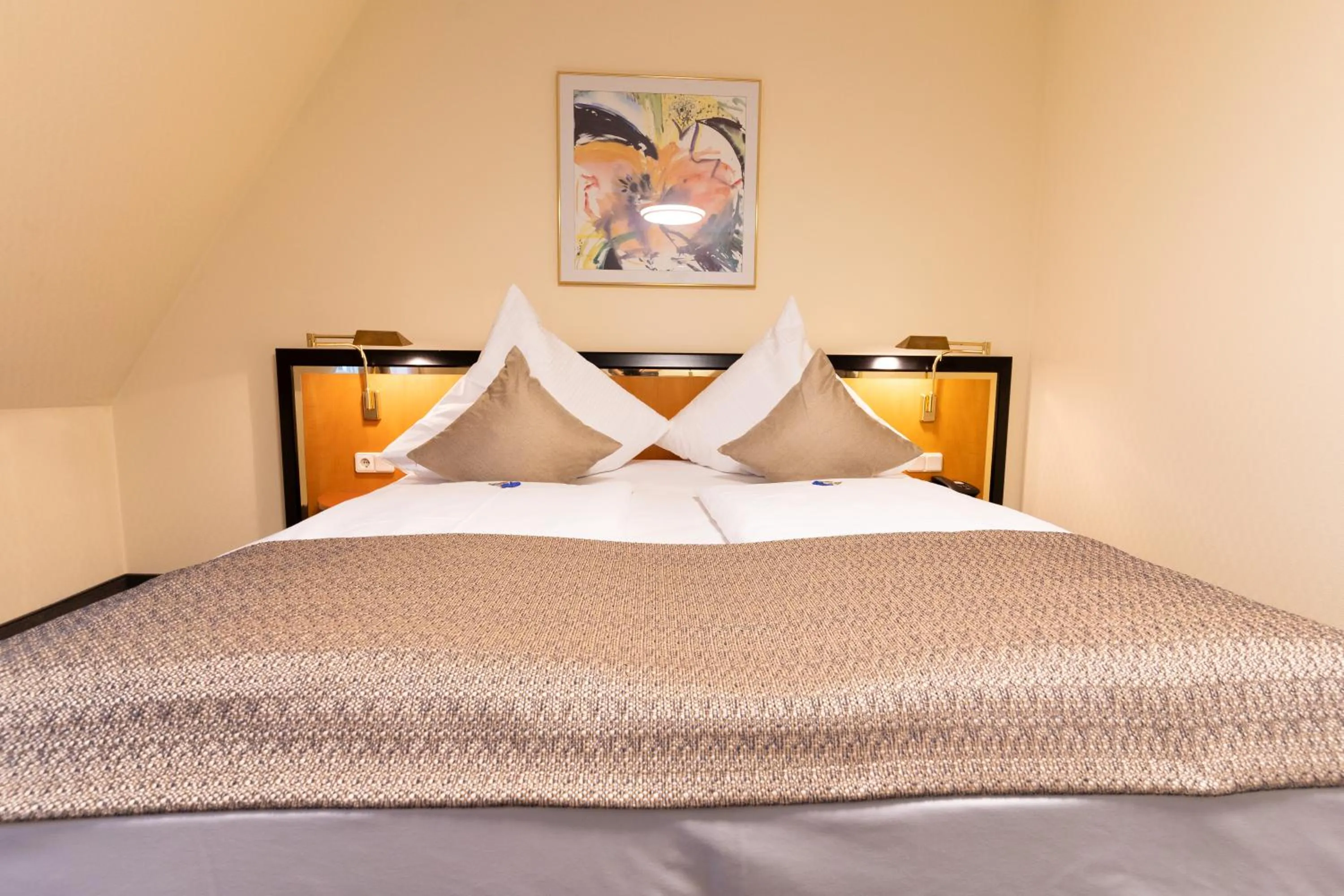 Bed in Hotel am Stadtgarten