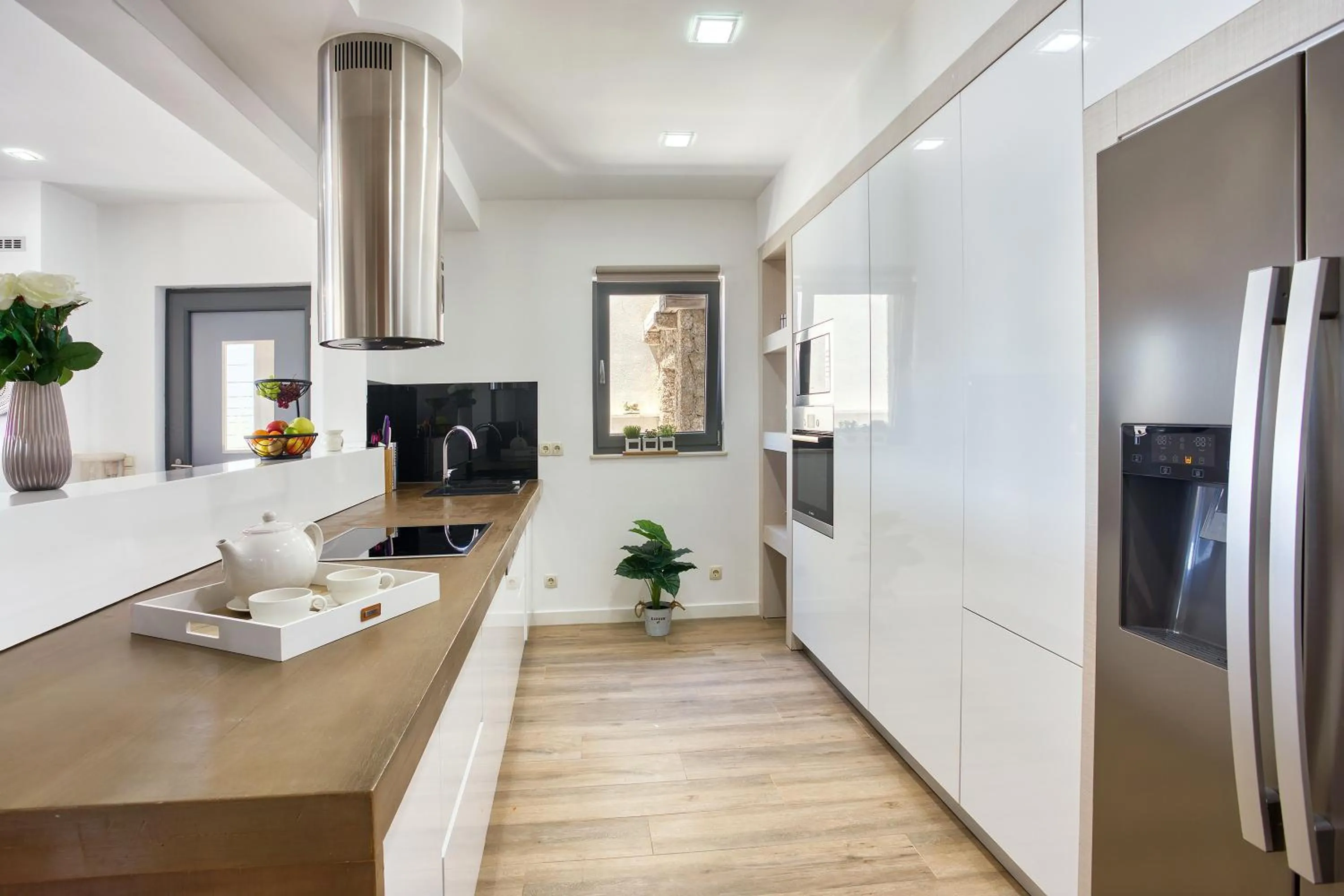 Kitchen or kitchenette in LUXURY VILLA PARADISE 120m from sandy beach, heated pool, billiard, max 12 pax