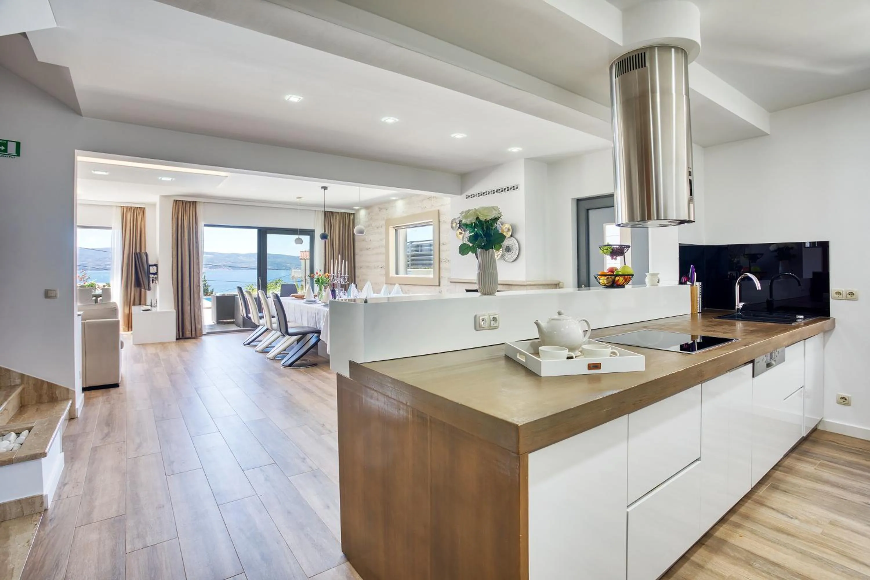Kitchen or kitchenette in LUXURY VILLA PARADISE 120m from sandy beach, heated pool, billiard, max 12 pax