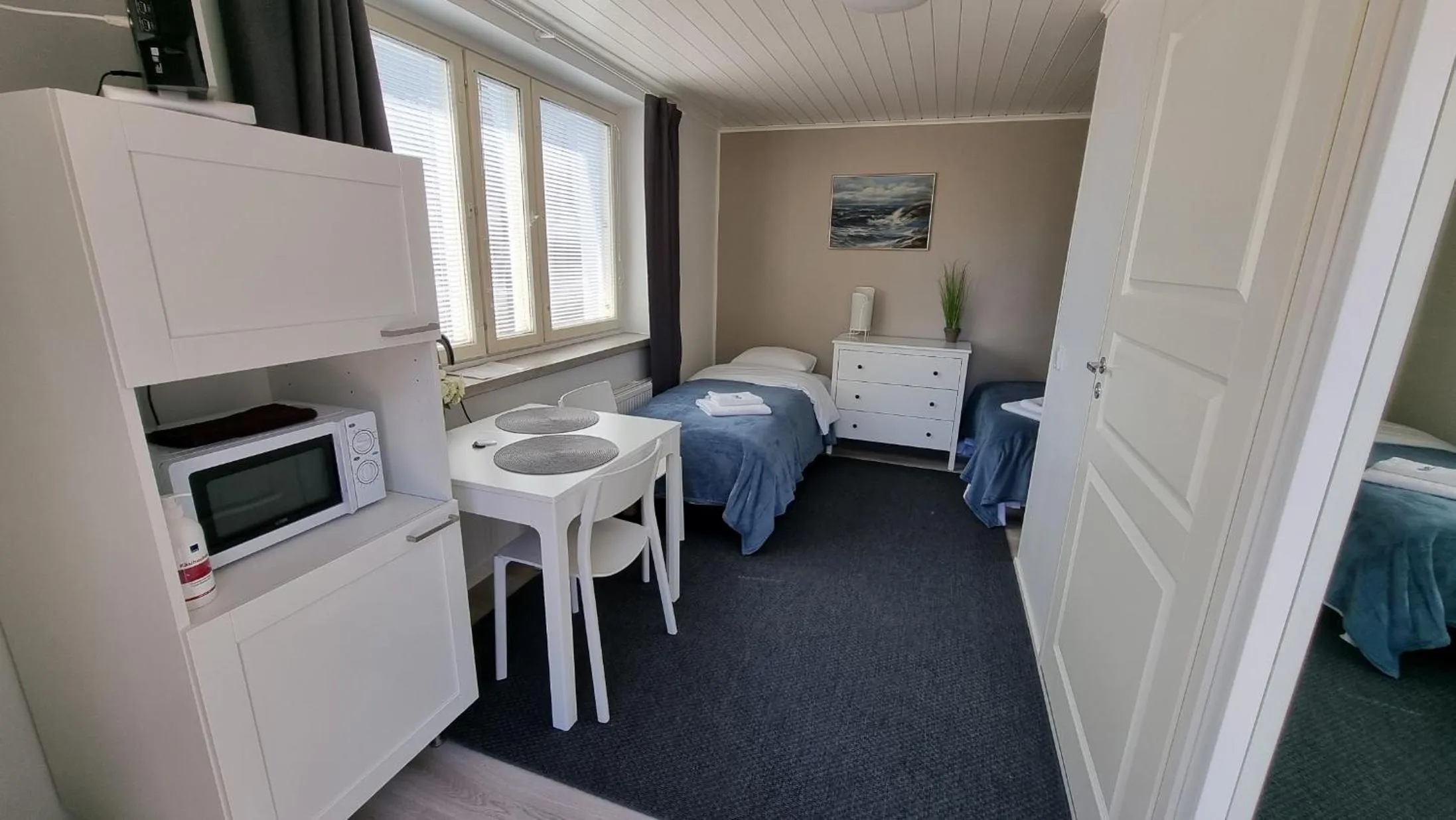 Kitchen or kitchenette, Bed in Vanha-Merivartioasema